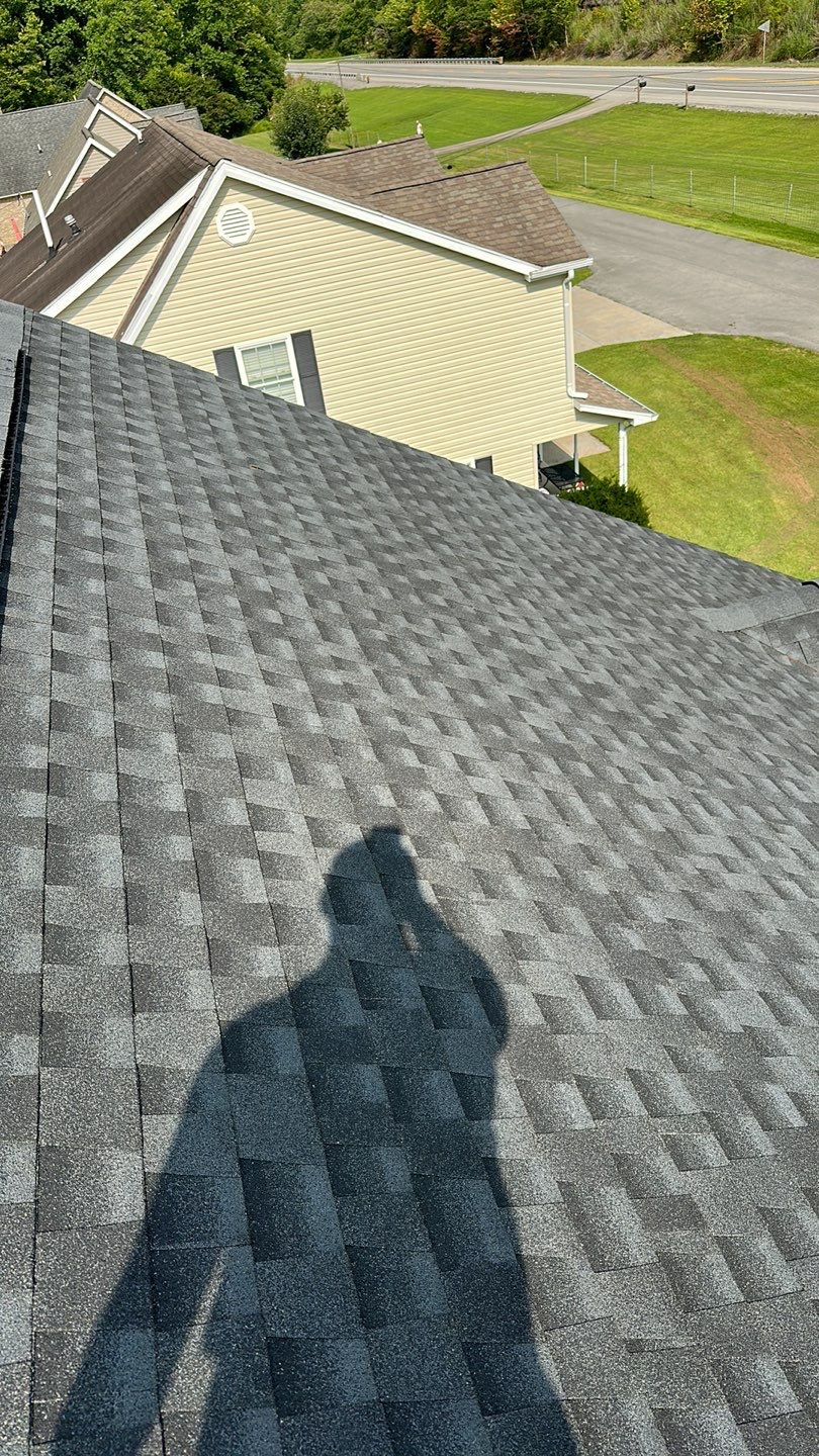 Residential Roofing Installation using Performance Shingles by Mr. Roofer