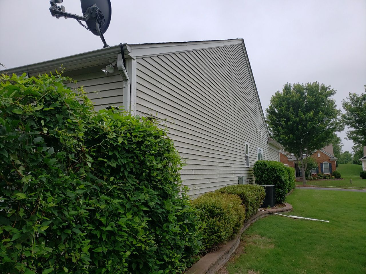 House Wash using cleaner by Power Wash Masters LLC