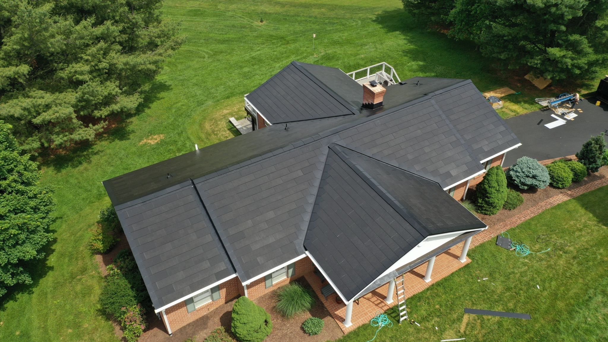 Tesla Solar Roof Installation by American Home Contractors