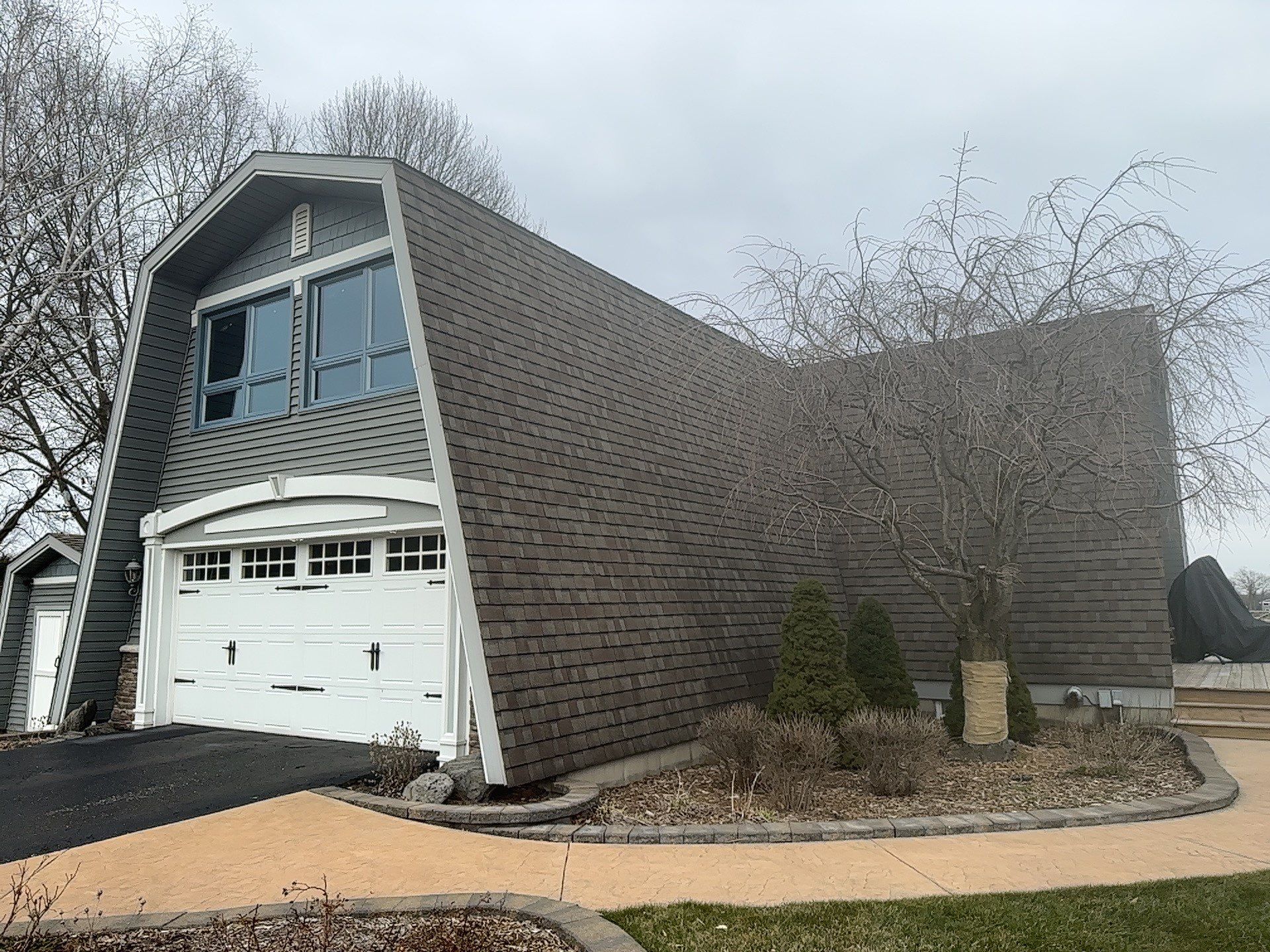 Metal Slate Shingle Roof in Sturgis, Michigan – “Darth Vader Helmet” Home by 4Ever Metal Roofing