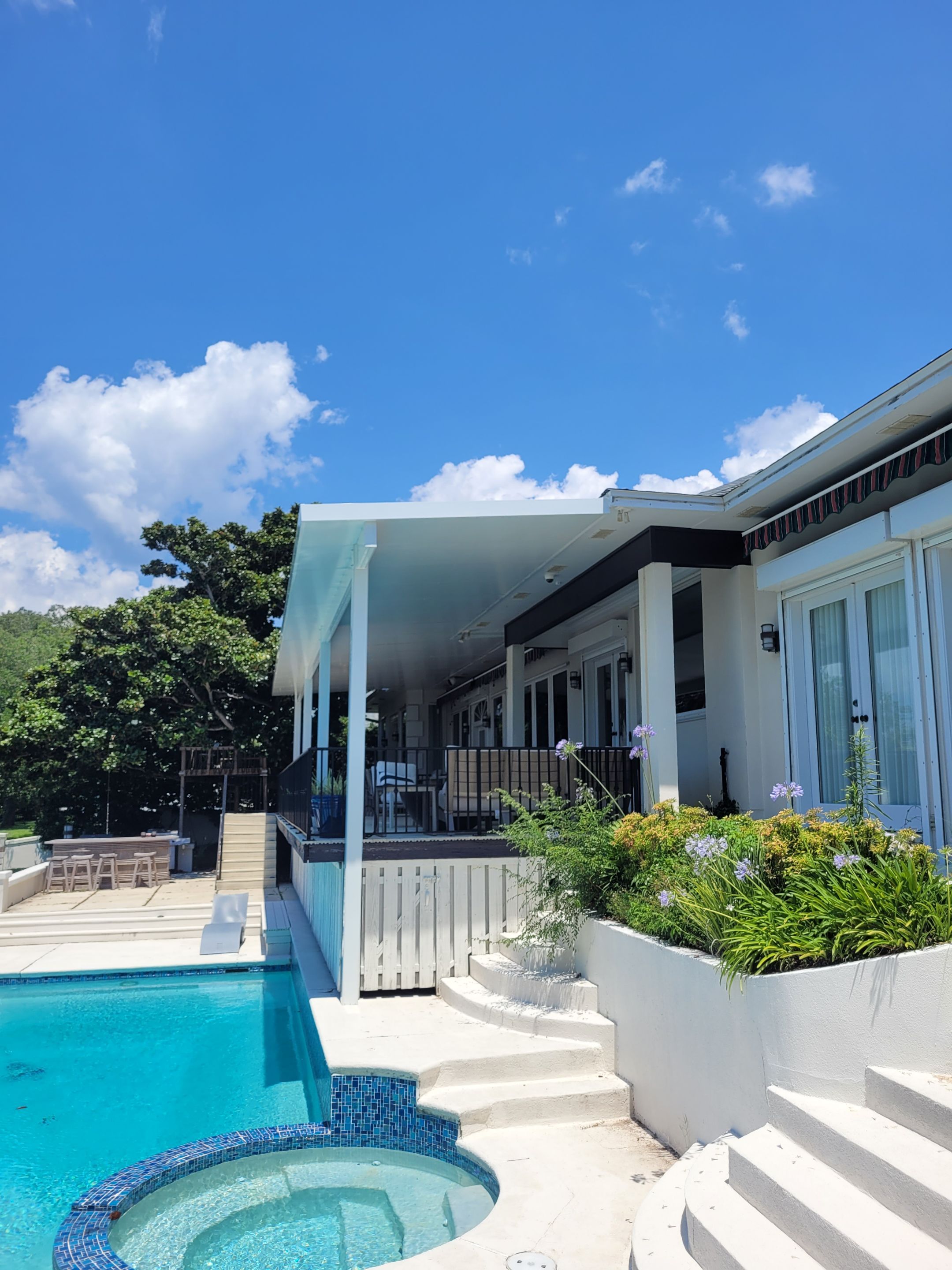 Poolside Colorbeam Patio Cover in Gulf Breeze by Titan Sunrooms