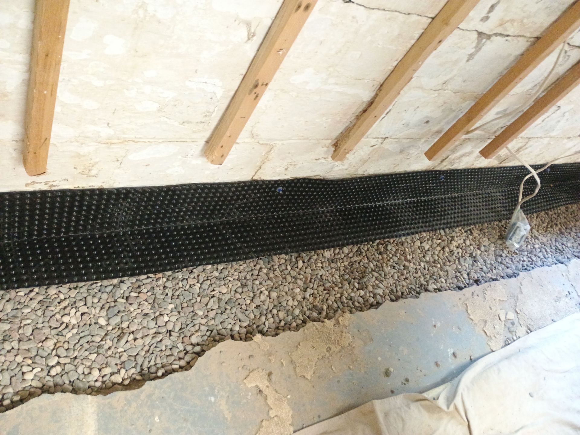 Interior Drain Tile Installation in South Minneapolis by Waterproofing Northeast