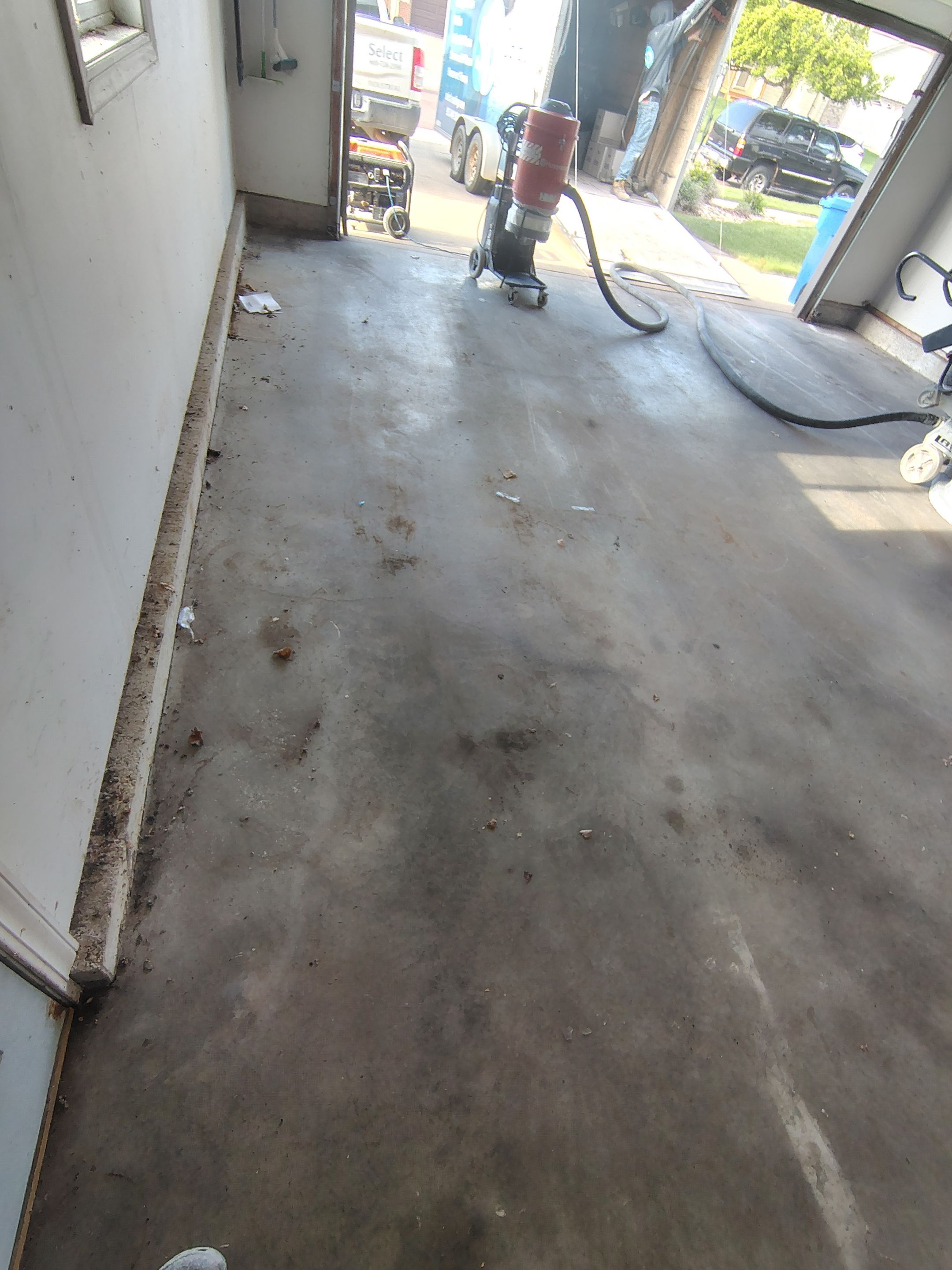 Decorative Chip Epoxy Garage Floor Coating in Sioux Falls by Select Painting, Coatings & Garage Cabinets