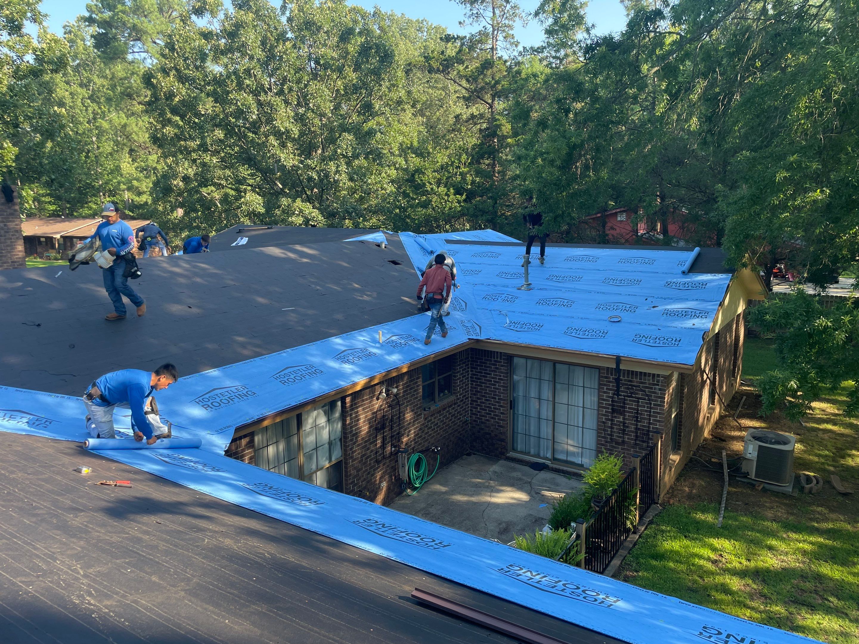 Storm Restoration Reroof: 25 Year 3-Tab Shingle by Hostetler Roofing