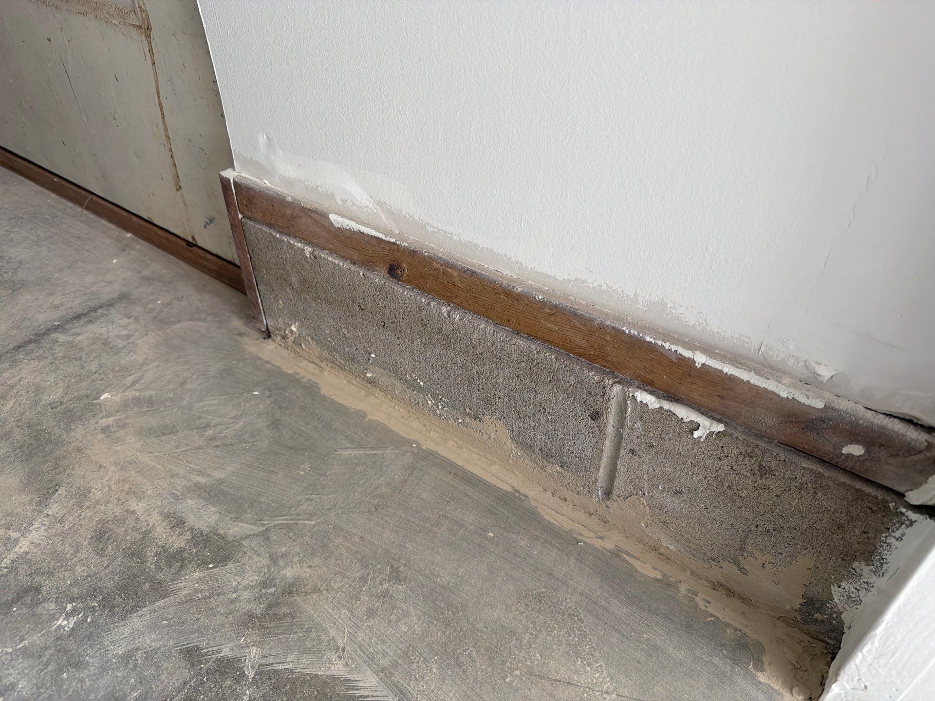 Decorative Chip Concrete Coating Installation in Luverne by Select Painting, Coatings & Garage Cabinets