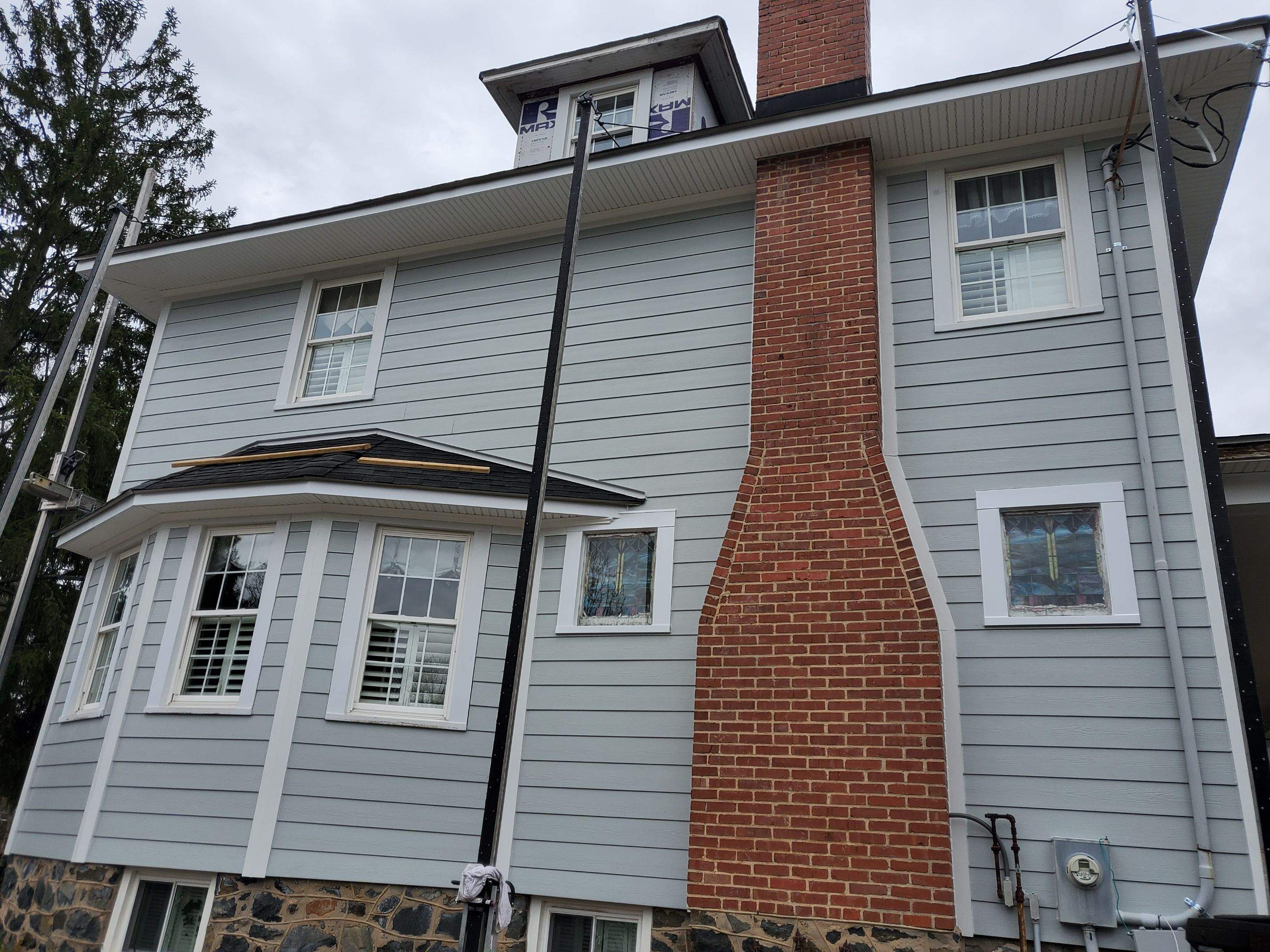 Siding Replacement using James Hardie siding by American Home Contractors
