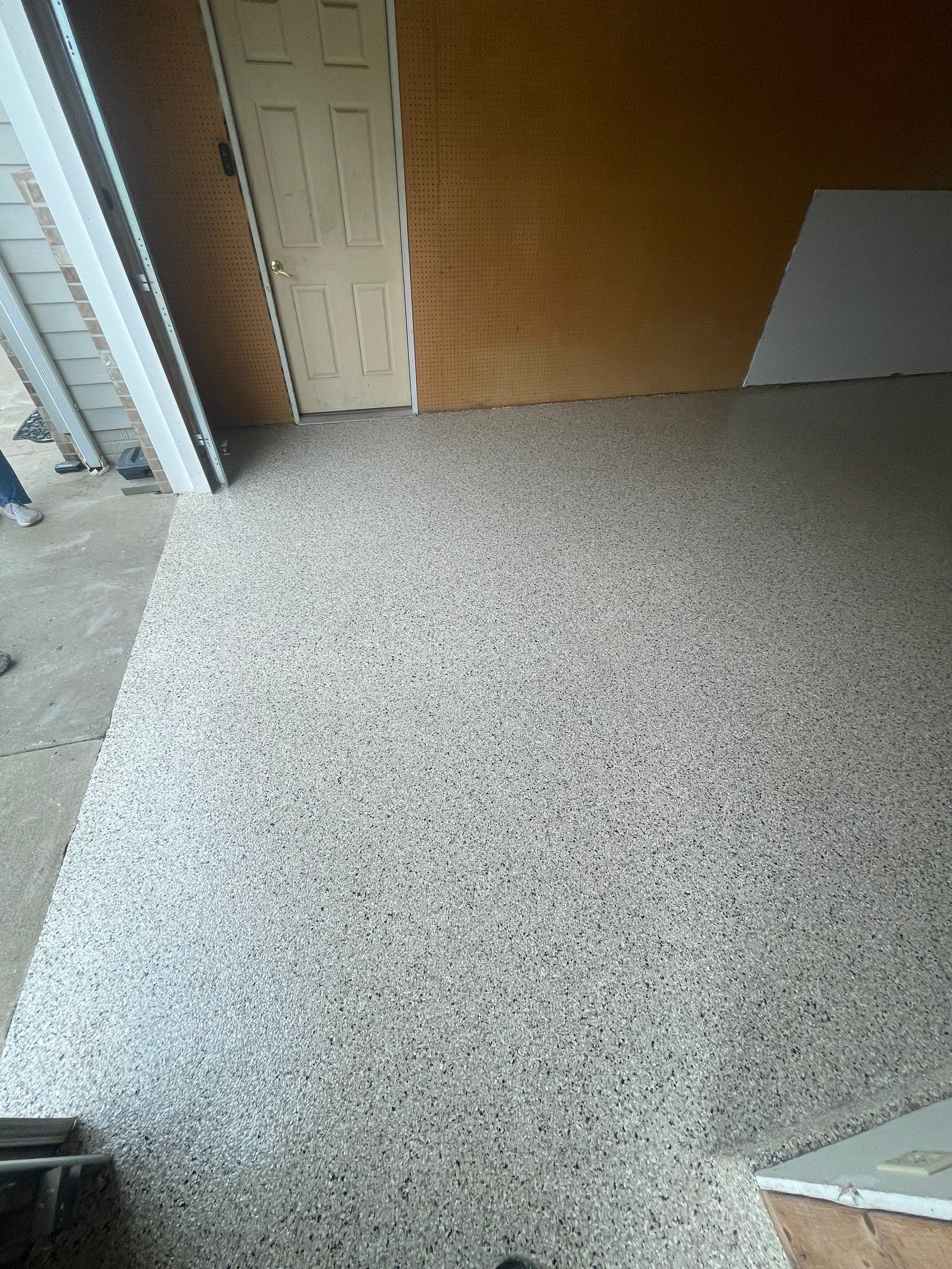 Speckled Epoxy Floor Coating Installation for Centerville Residential Garage by Select Painting, Coatings & Garage Cabinets