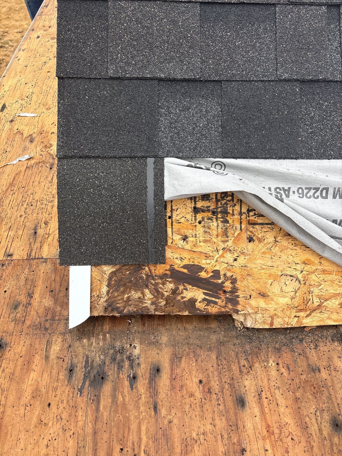 Residential Roof Replacement with Metal Accents by Orezona Building & Roofing Company, Inc.