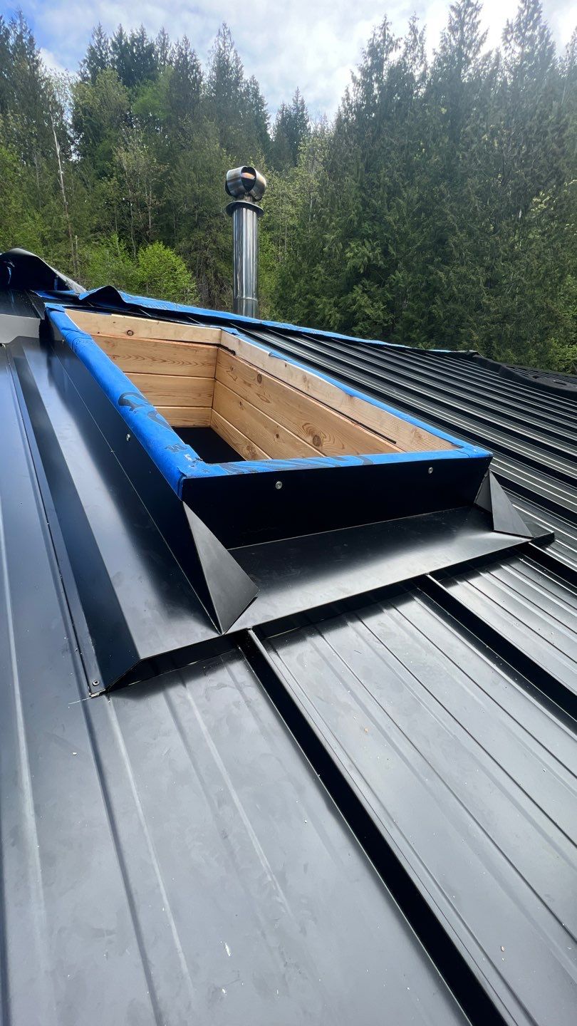Residential ReRoofing Installation using 12" Prolok metal by Top Notch Roofing Inc