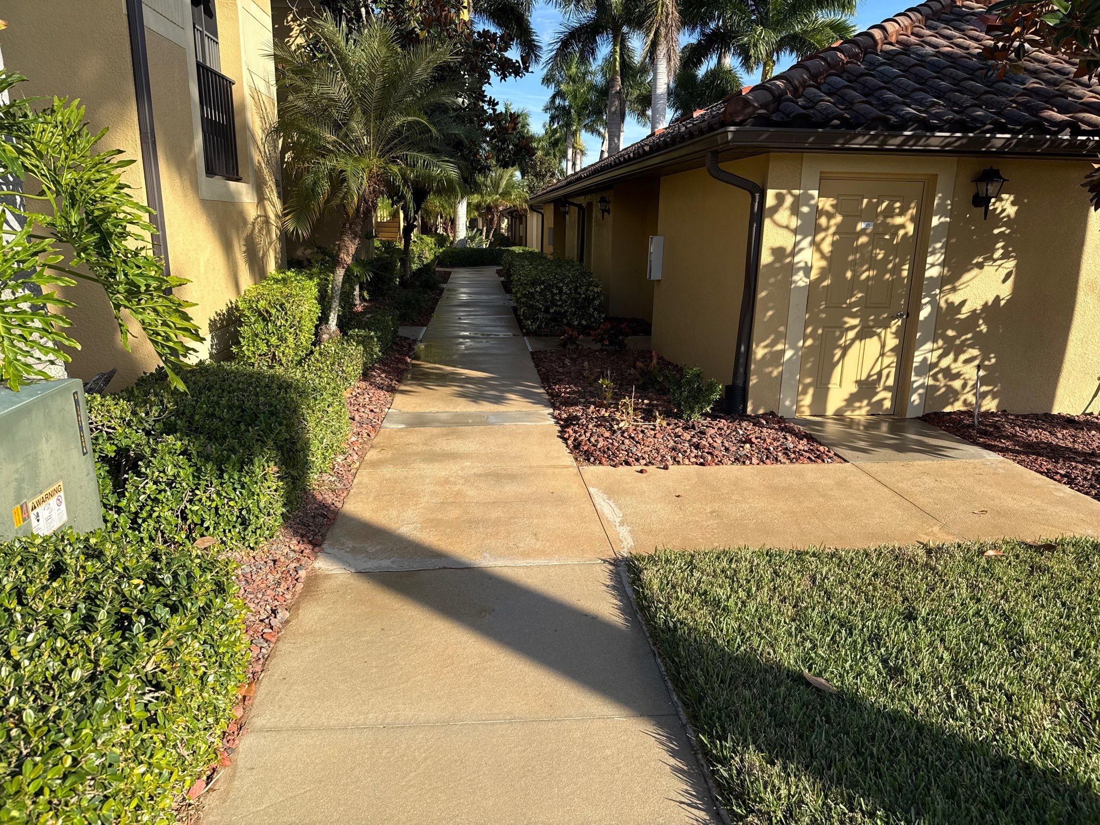 HOA Condo Concrete Driveway & Sidewalk Cleaning – River Strand Community, Bradenton, FL by Sunshine AquaWash