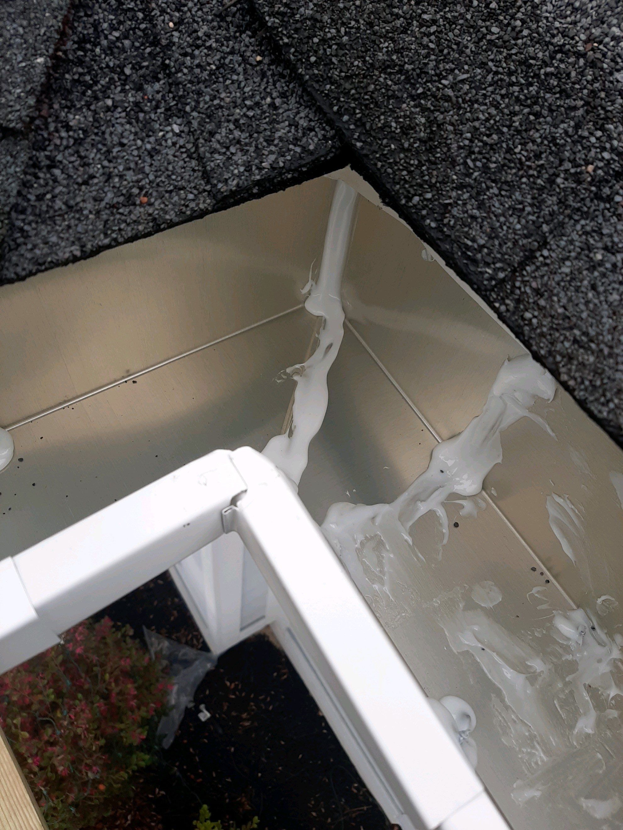 Gutter Installation using White K-Style Seamless Gutters by Gutter Professors