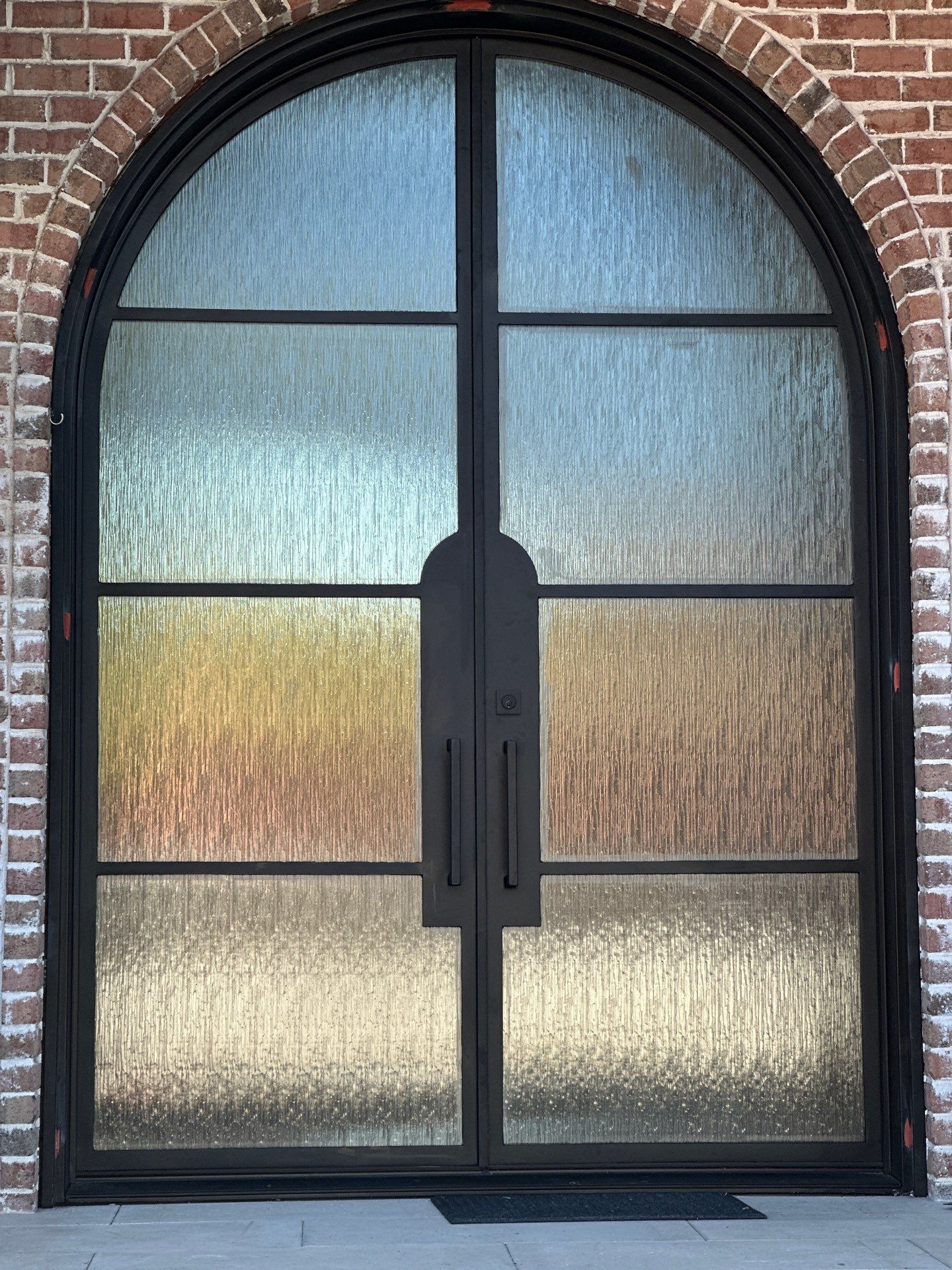 Custom Arched Metal Entry Door Installation in Plano by Solara Custom Living