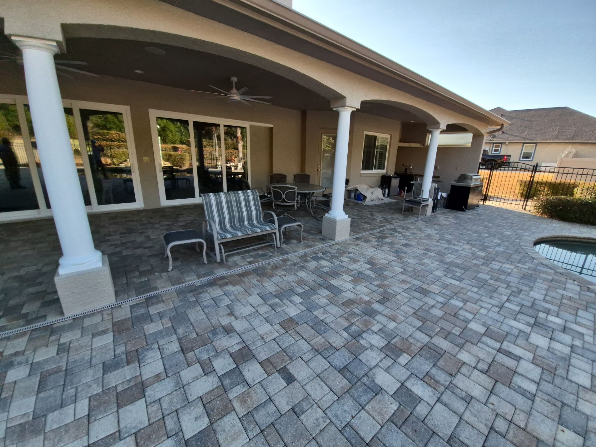 Brick Paver Sealing and Cleaning for Ocala Home and Pool Deck by Infinite Exteriors LLC