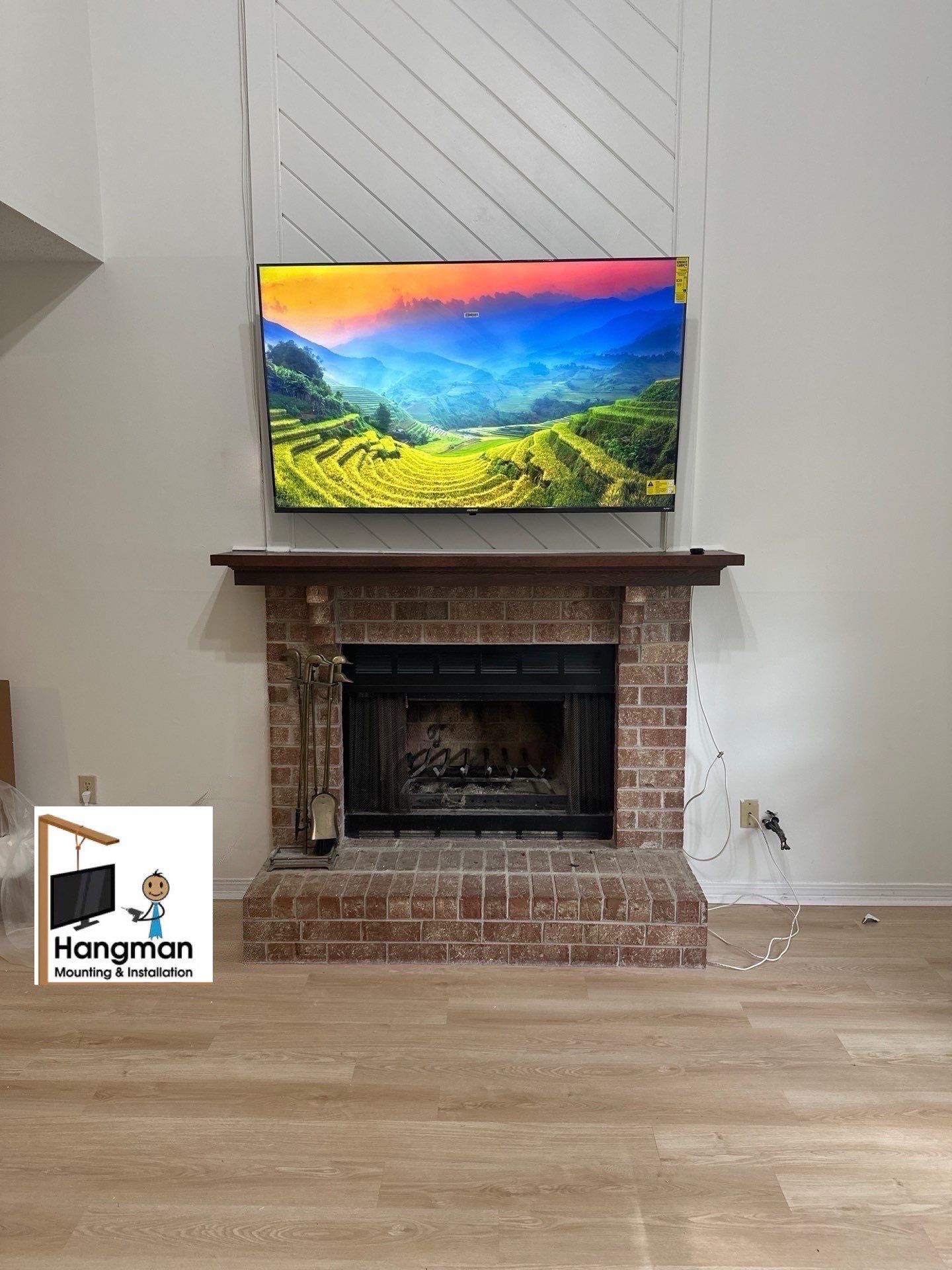 Fireplace TV Mounting Projects by Hangman Mounting & Installation 