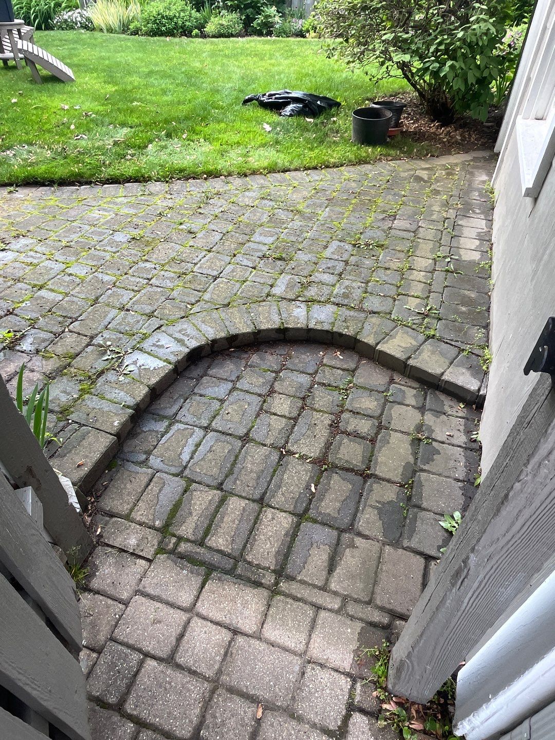 Brick paver cleaning and sealing by Northern Power Washing LLC.