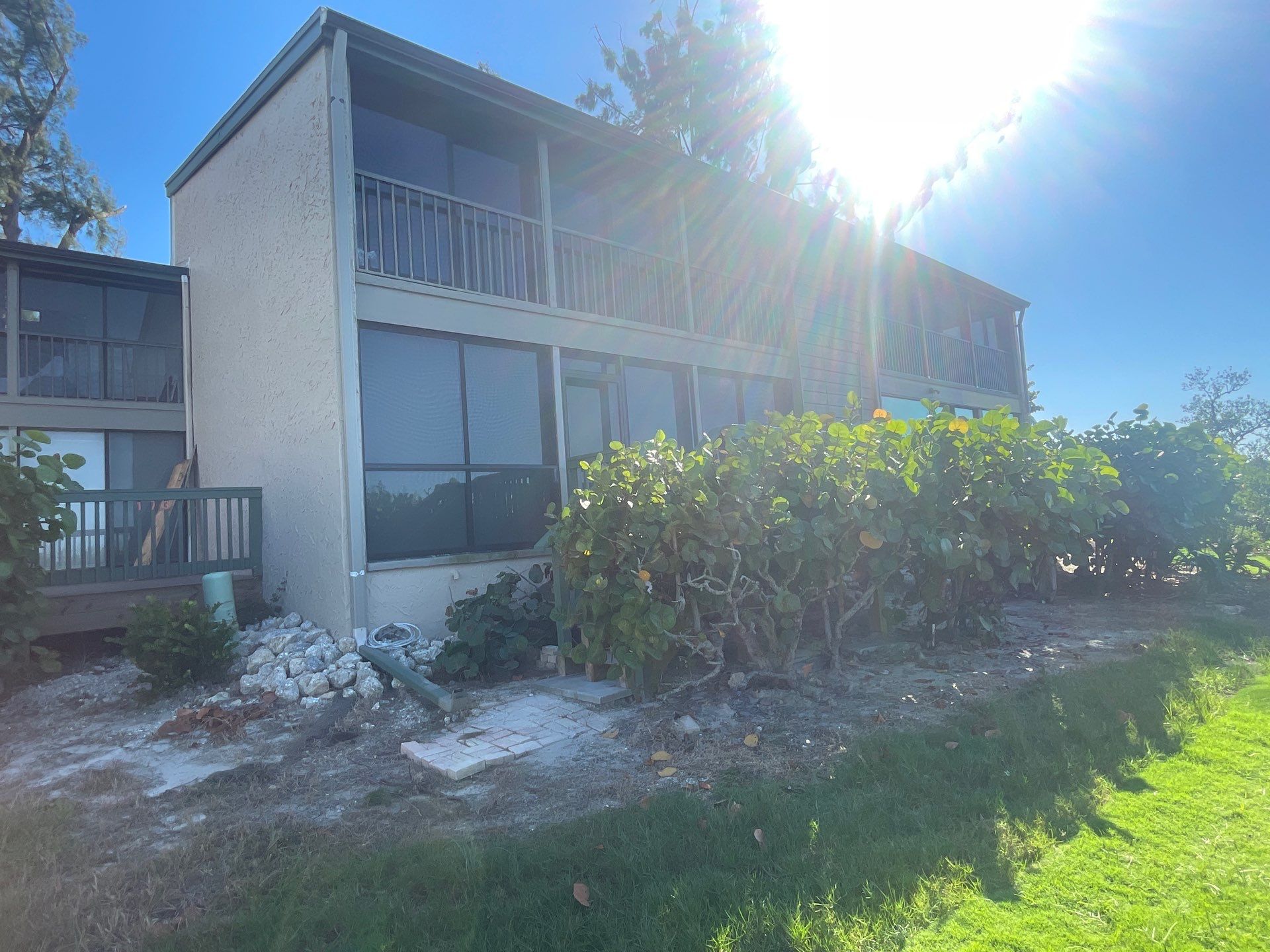 White Gutters Repair and Installation in Sarasota FL by Gutter Professors
