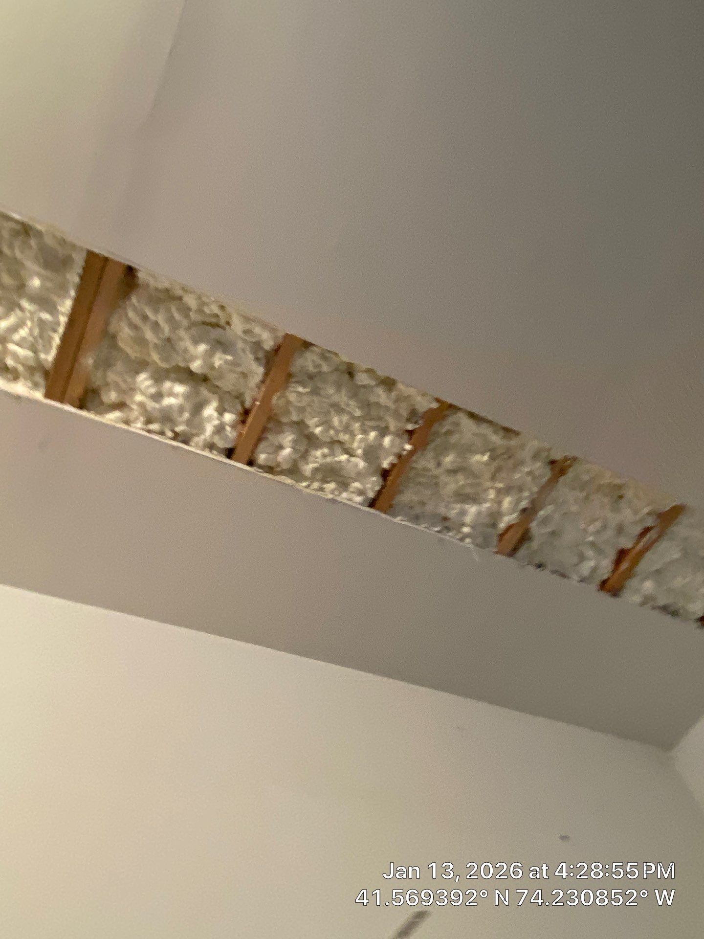 Garage ceiling using open cell spray foam by NYS Foam & Energy