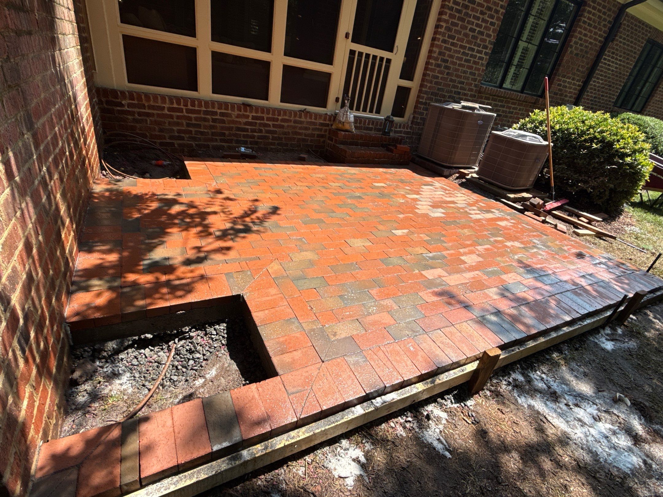 Brick patio in Durham by Martinez Brother’s Nc Landscaping Inc