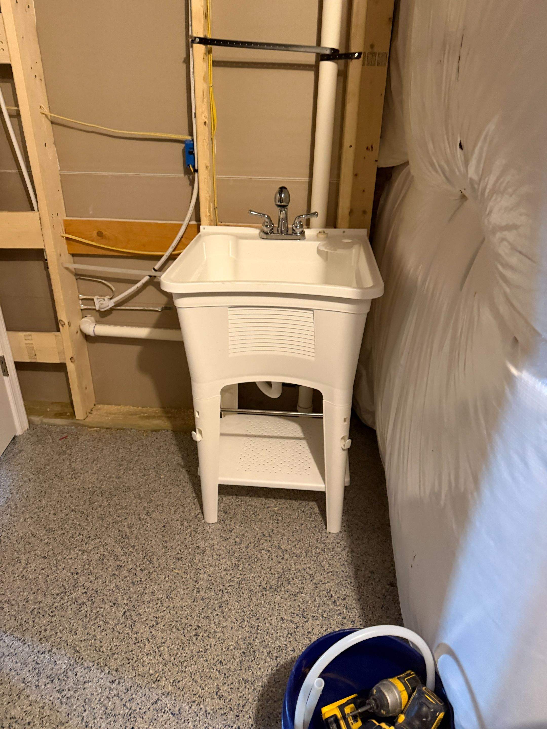 Garage Storage Lift & Basement Utility Sink Installation by Laser Focused Solutions LLC