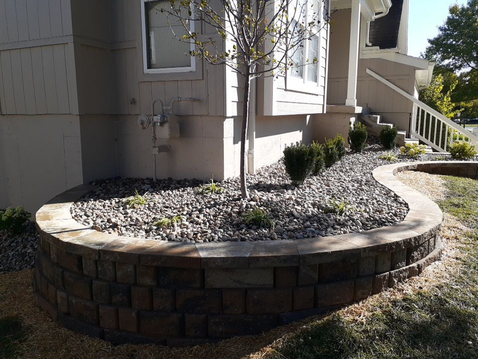 Front Yard Elevated landscape by LAND ESCAPES LLC