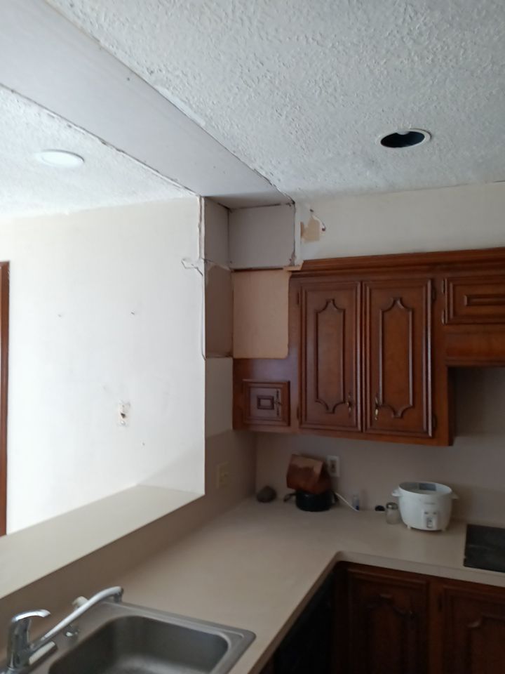 Interior and exterior painting project by Roof Concepts Construction