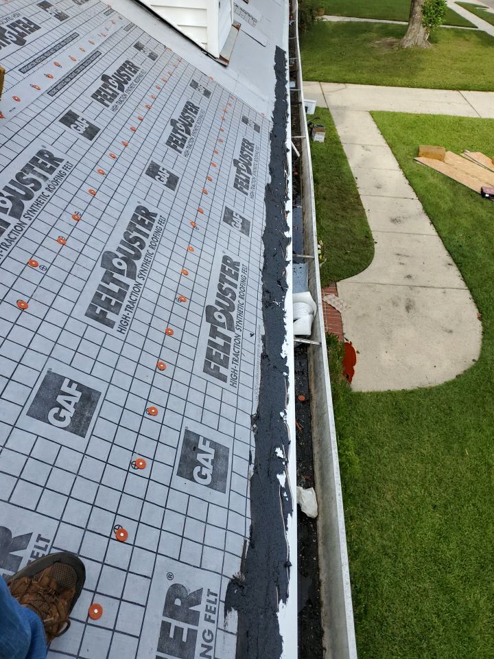 Residential Roofing Installation using Roof Replacement by American Roofing & Construction LLC