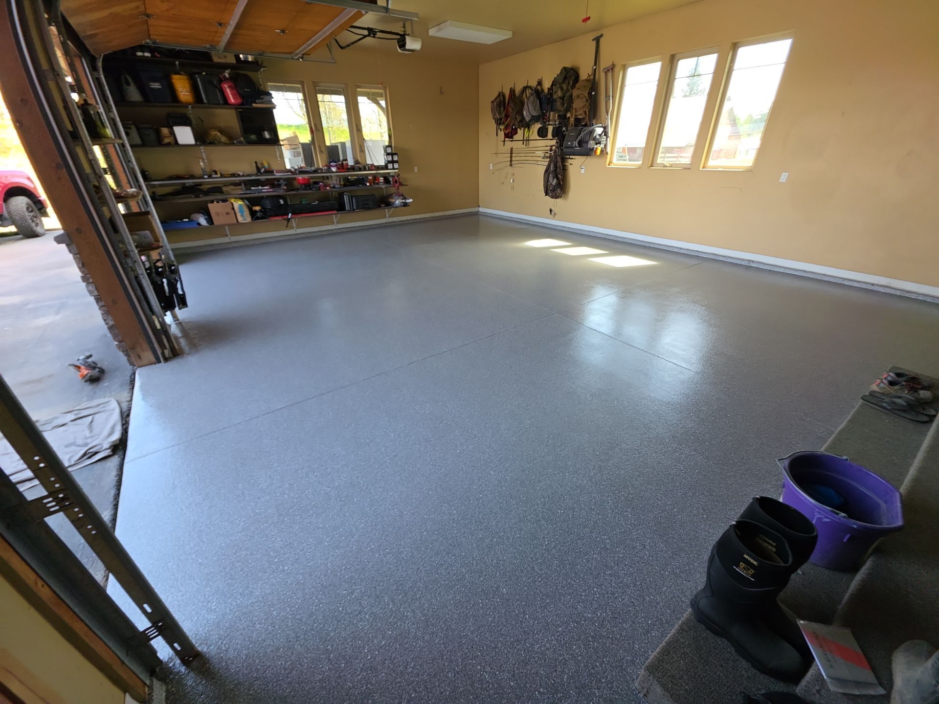 Turquoise Hybrid Polyaspartic Garage Floor Coating in Sandpoint by Croc Coatings, LLC