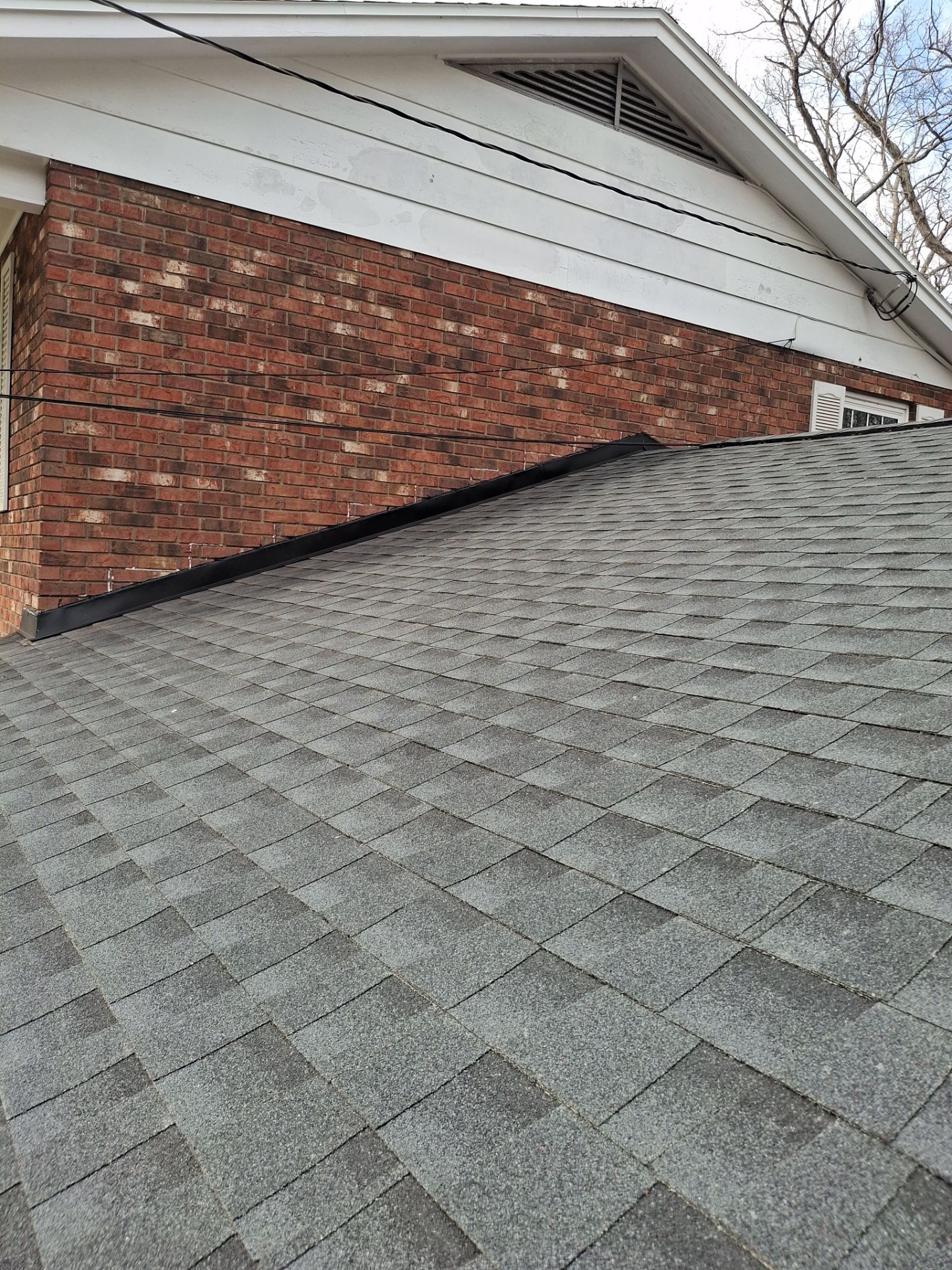 Residential Roofing Installation using GAF Timberline HDZ Charcoal by Rainstoppers Roofing