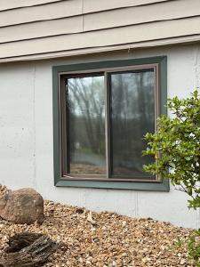 Exterior Entry Door and Garage Door Painting by Legendary Services Company LLC.