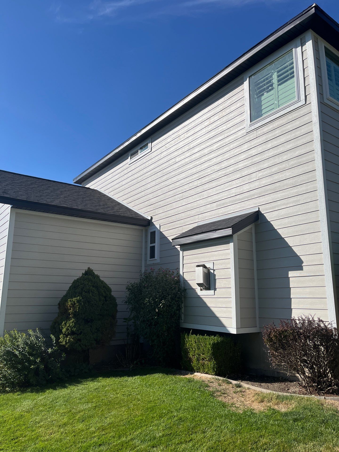 Farmington | Stucco/Vinyl Demo & Hardie Conversion | Cobble Stone & Black by Ideal Siding Utah