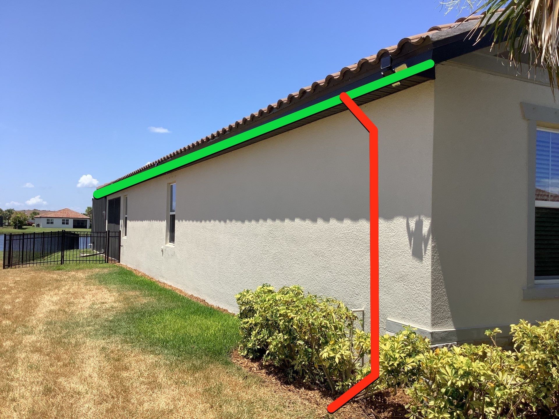 Musket brown seamless gutters with splash guards, new downspouts, and extensions in Bradenton, FL by Gutter Professors