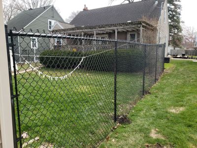 Black Vinyl Coated Chain Link Fence Installation in Waterloo