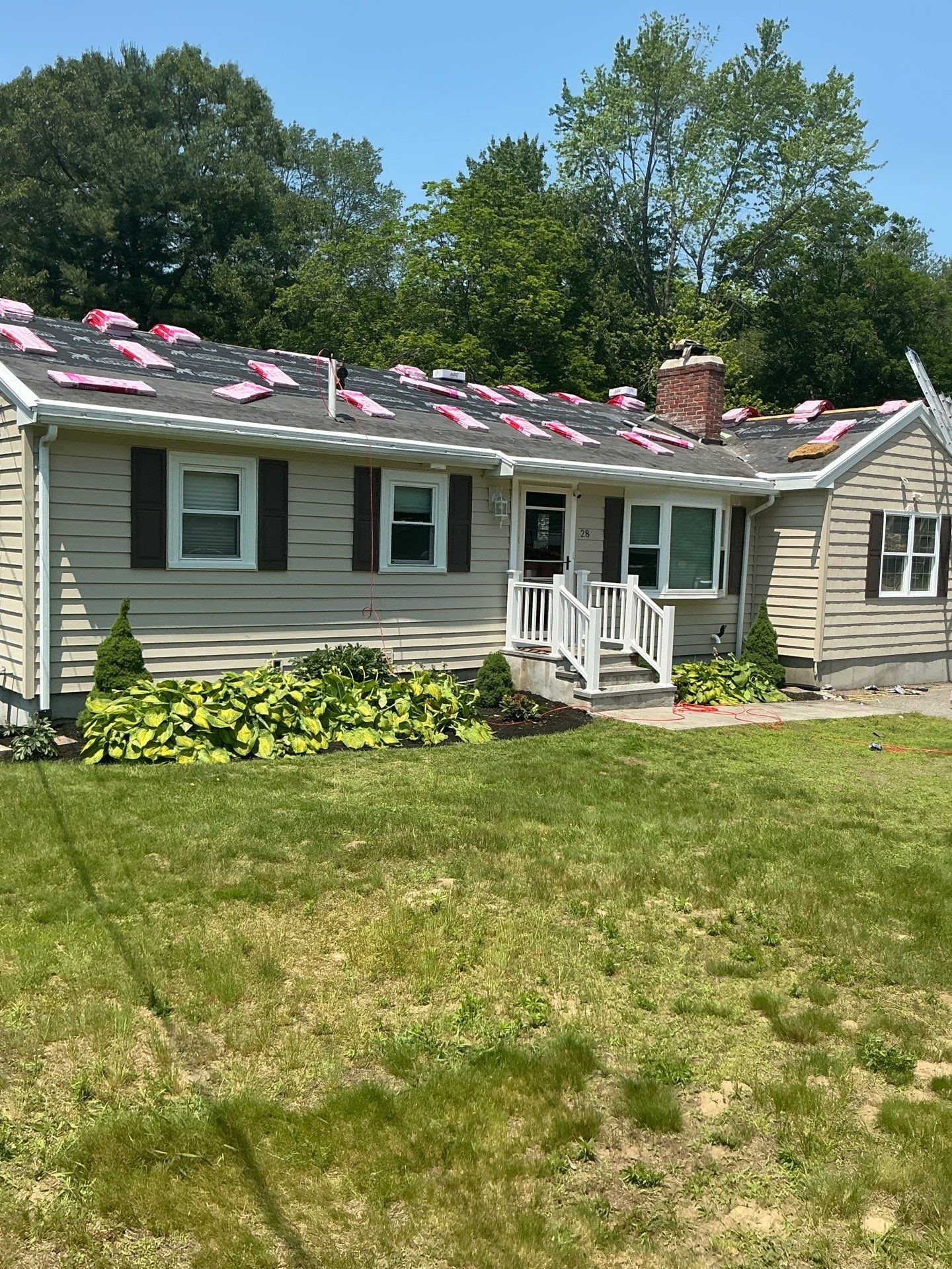 Full Roof Replacement & Chimney Repair – Onyx Black, MA by Mighty Dog Roofing of Greater Middlesex County