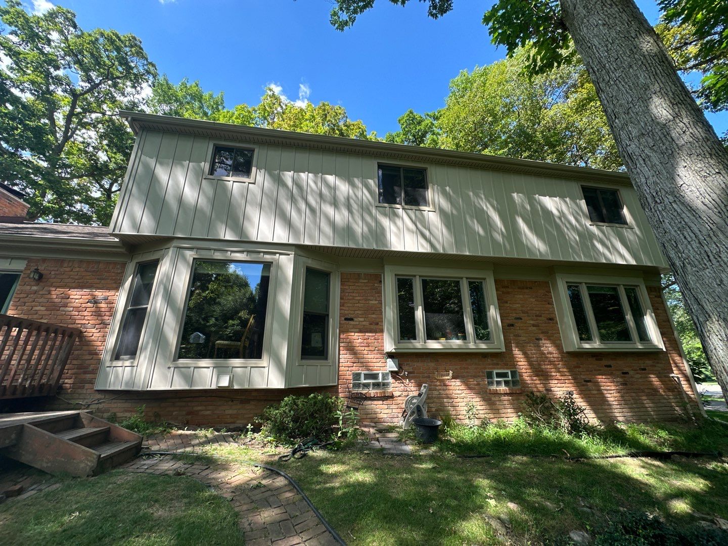 Siding Installation using Alside Monterey Sand by 180 Contractors