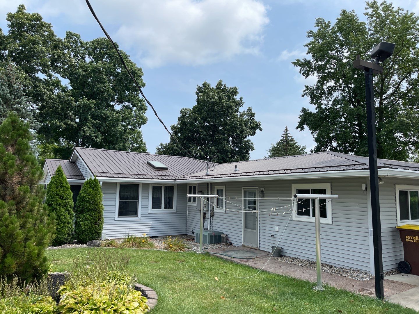 Residential Roofing Installation using Exposed Fastener Metal Roof by 4Ever Metal Roofing