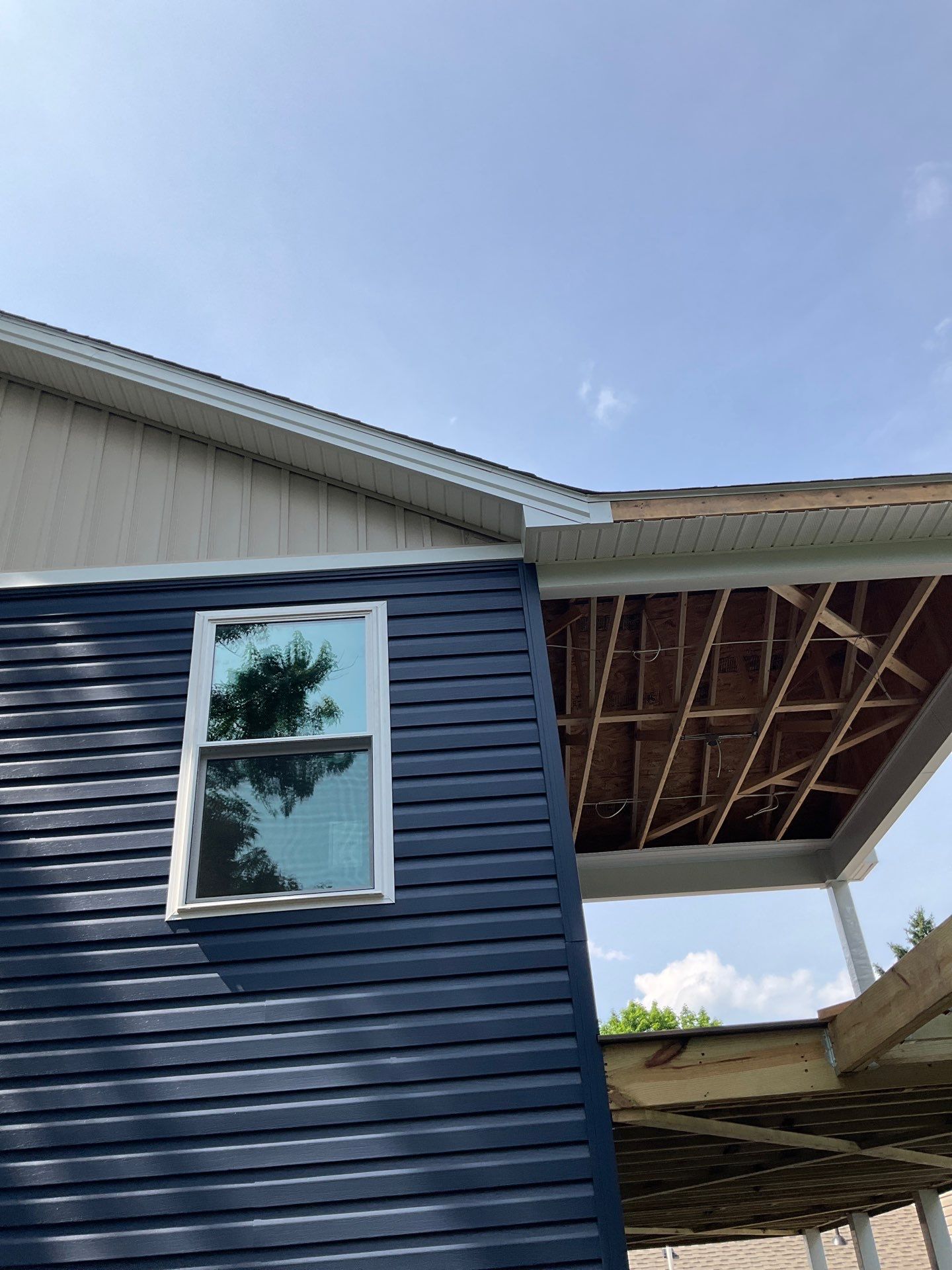 Two-Story Residential Addition and New Garage in Hummelstown by Esh Builders