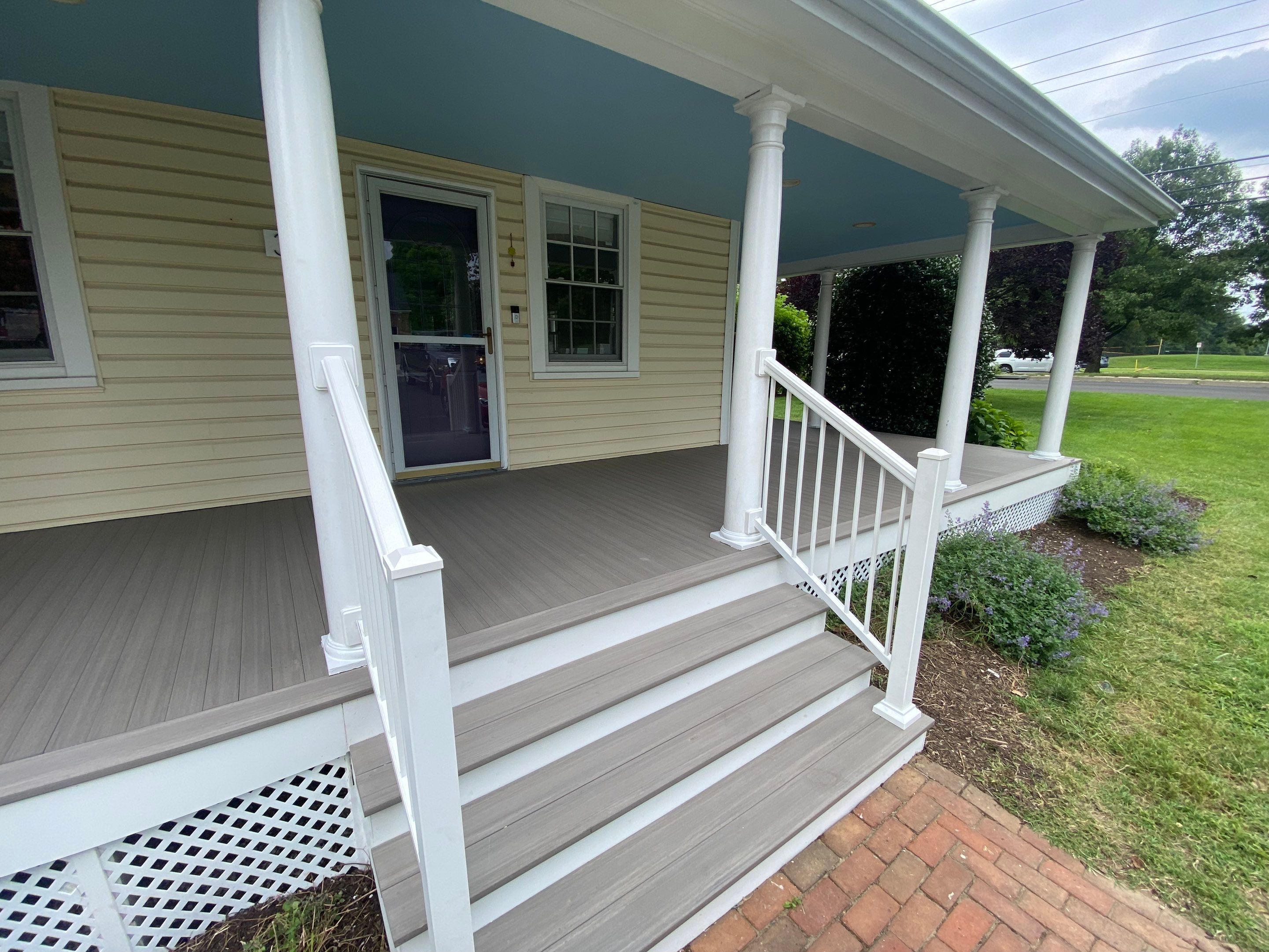 Front Porch Transformation using Timbertech Decking by The Smet Companies, LLC