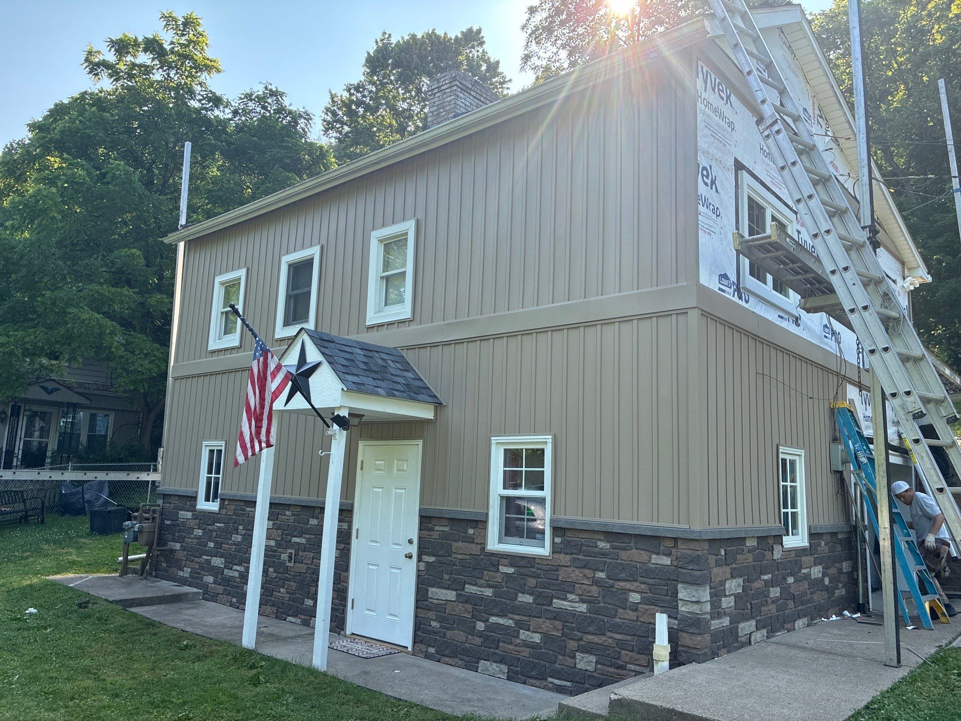 Jefferson Hills Vertical Board and Batten Siding and TandoStone Renovation by Ideal Siding Pittsburgh