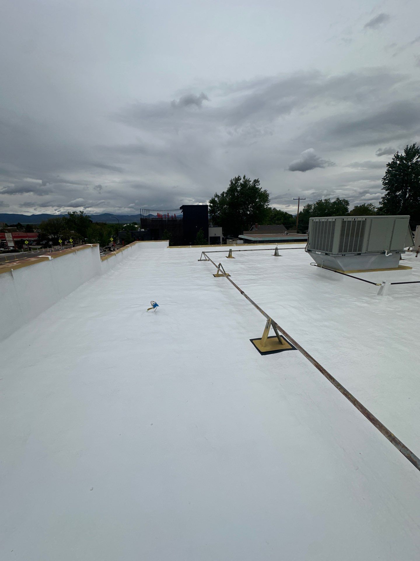Complete Roof Coating System by Blue Peaks Roofing LLC