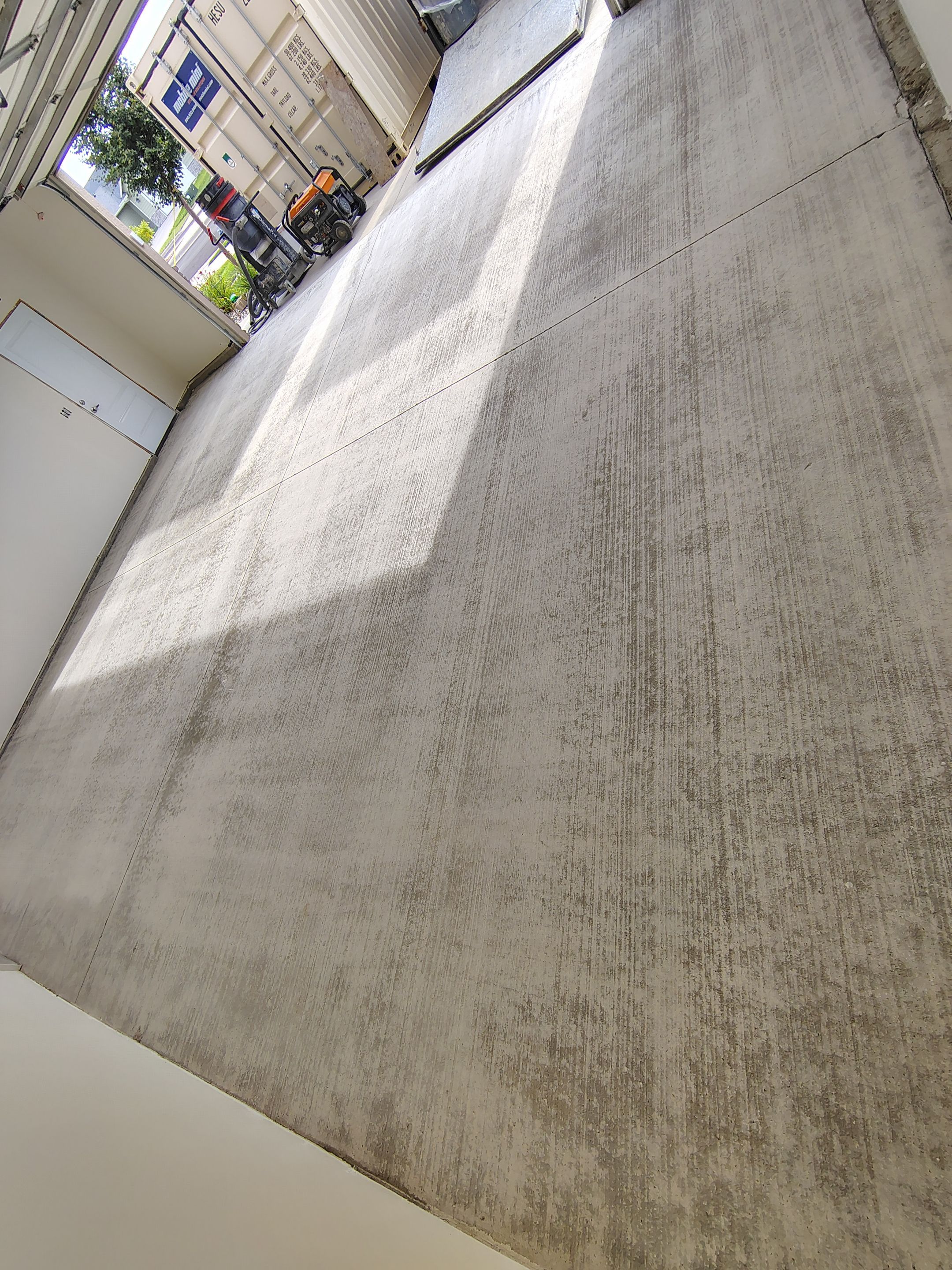 Garage Floor Coating with Coyote Decorative Chip in Tea by Select Painting, Coatings & Garage Cabinets
