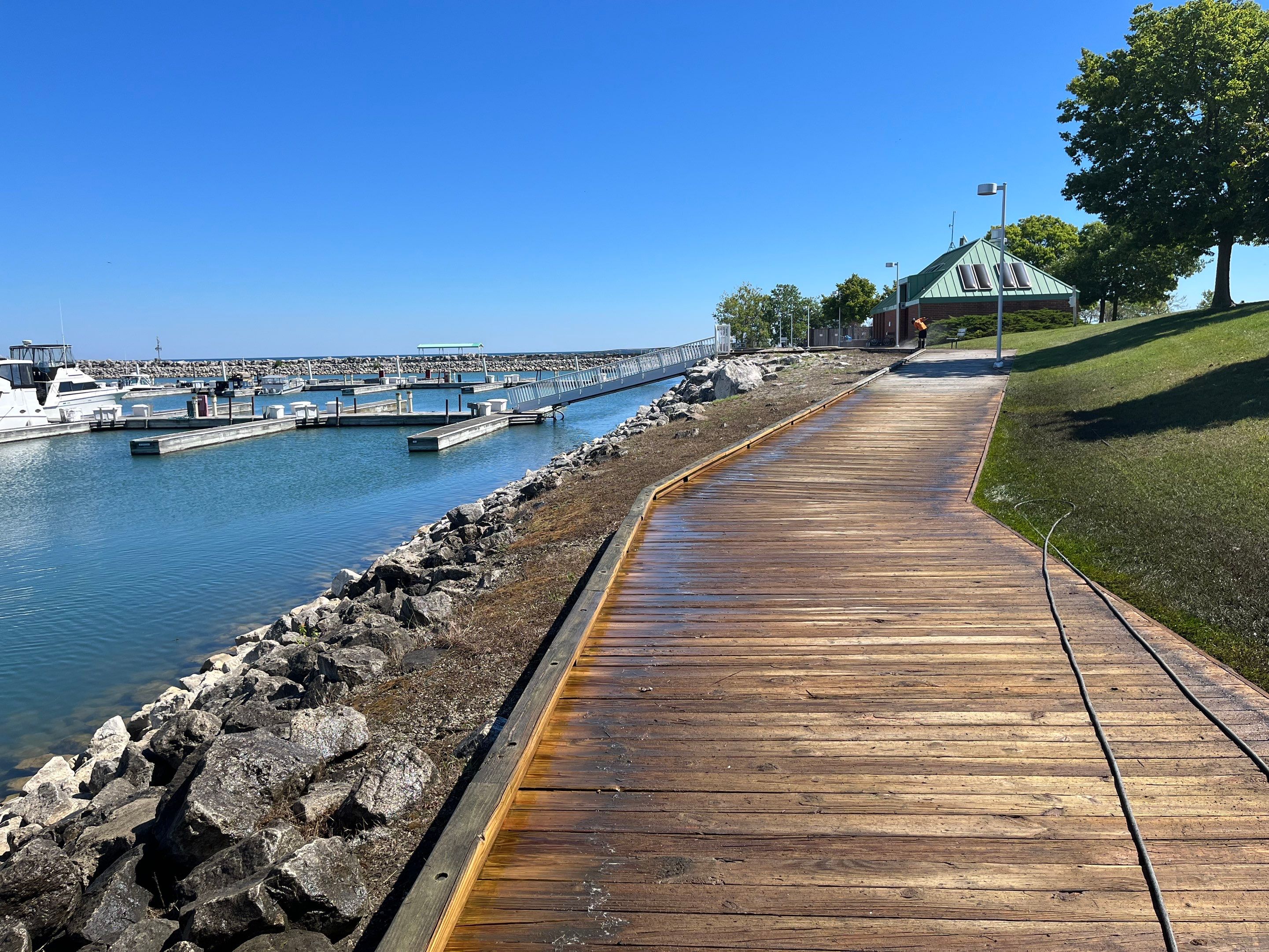 wood promenade cleaning by Northern Power Washing LLC.