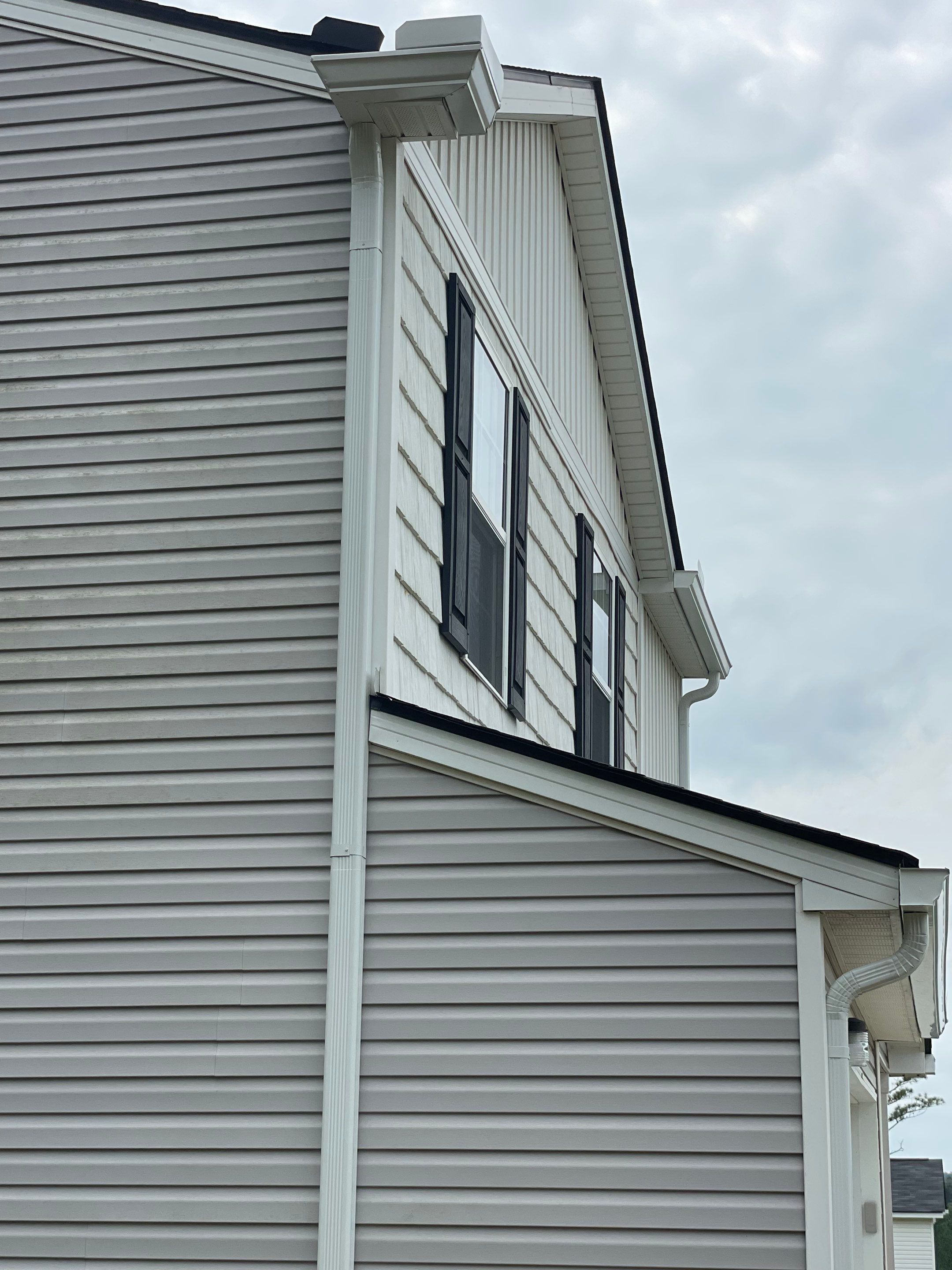 Gutters and Downspouts  by Deerfield Roofing LLC