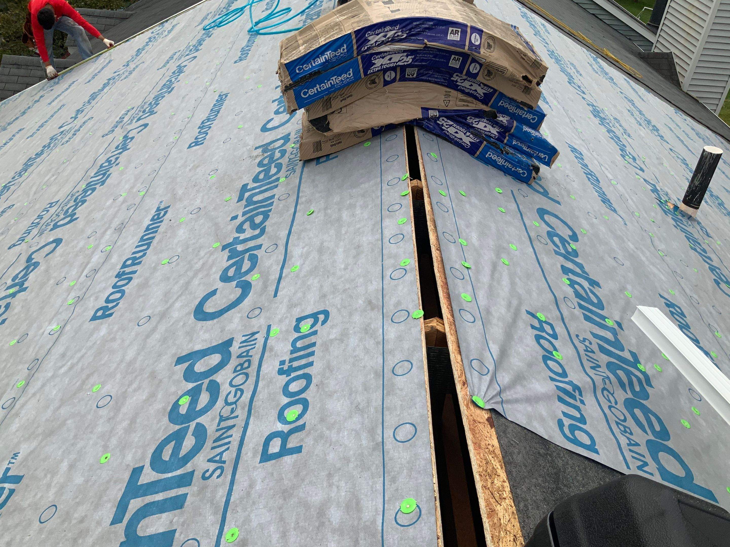 Residential Roofing Installation using XT-25 Color Moire Black by Alpha Design Services