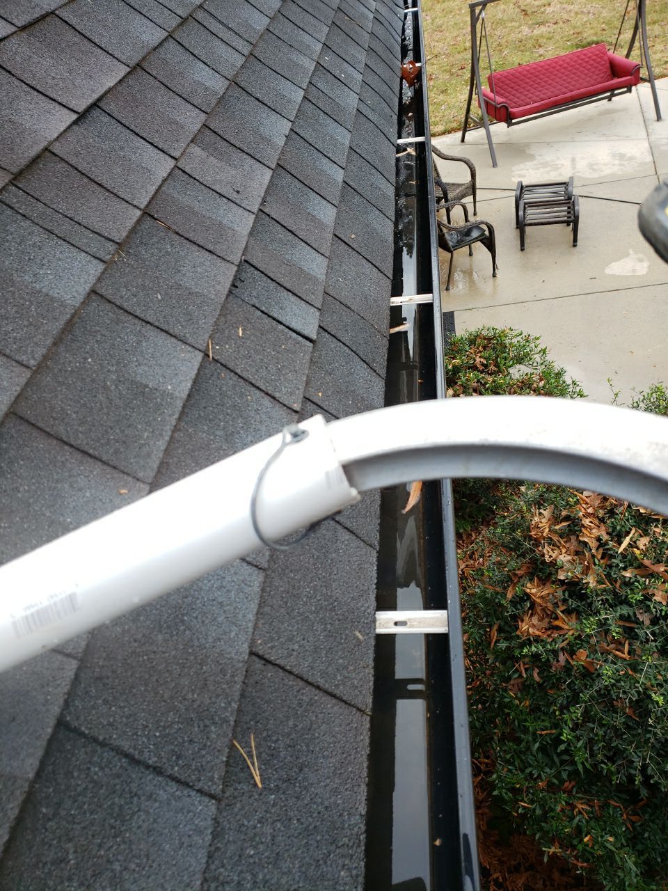 Gutter Cleaning using water by Power Wash Masters LLC