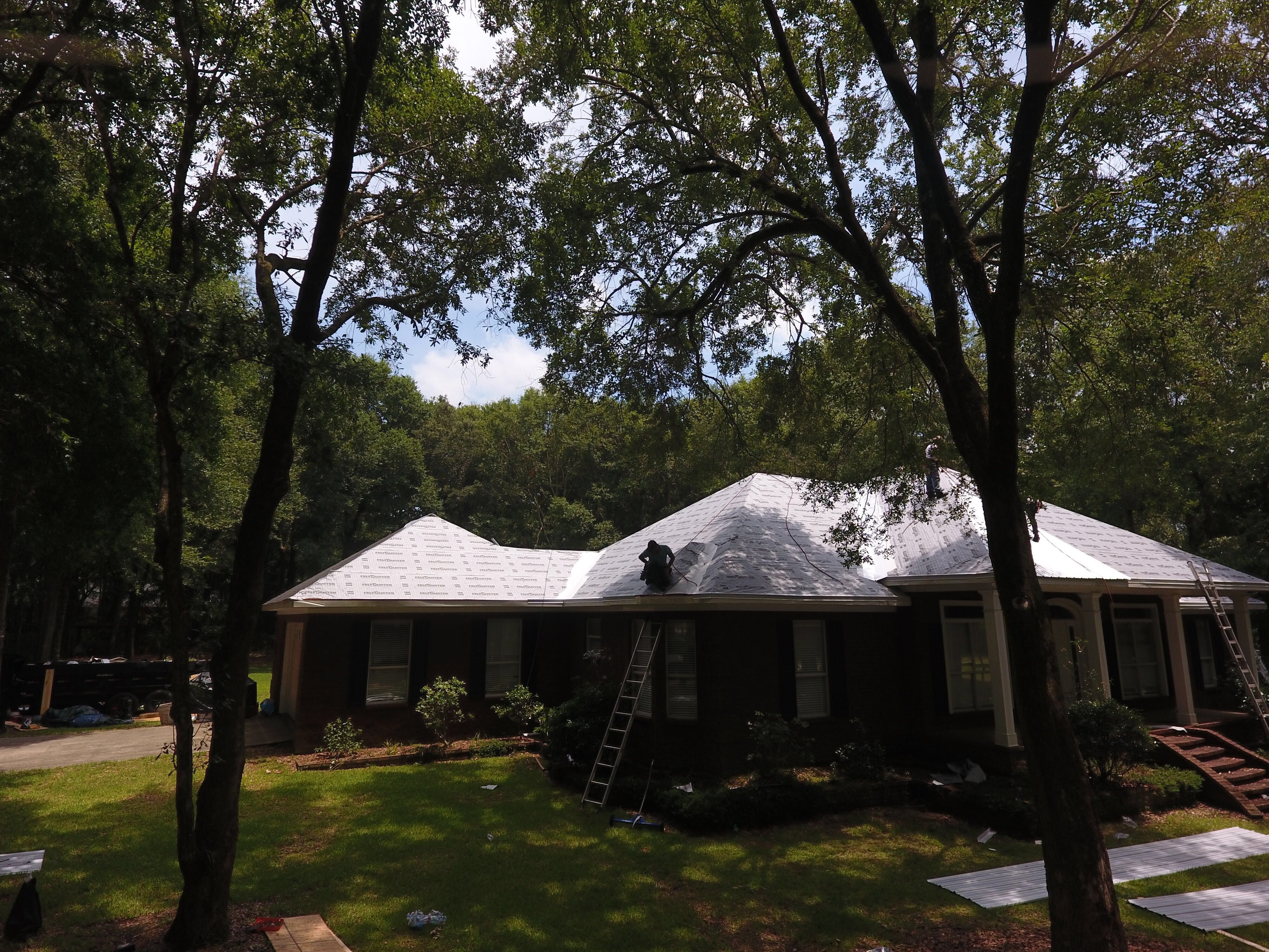 Residential Roofing Installation using Metal roofing by American Roofing & Construction LLC