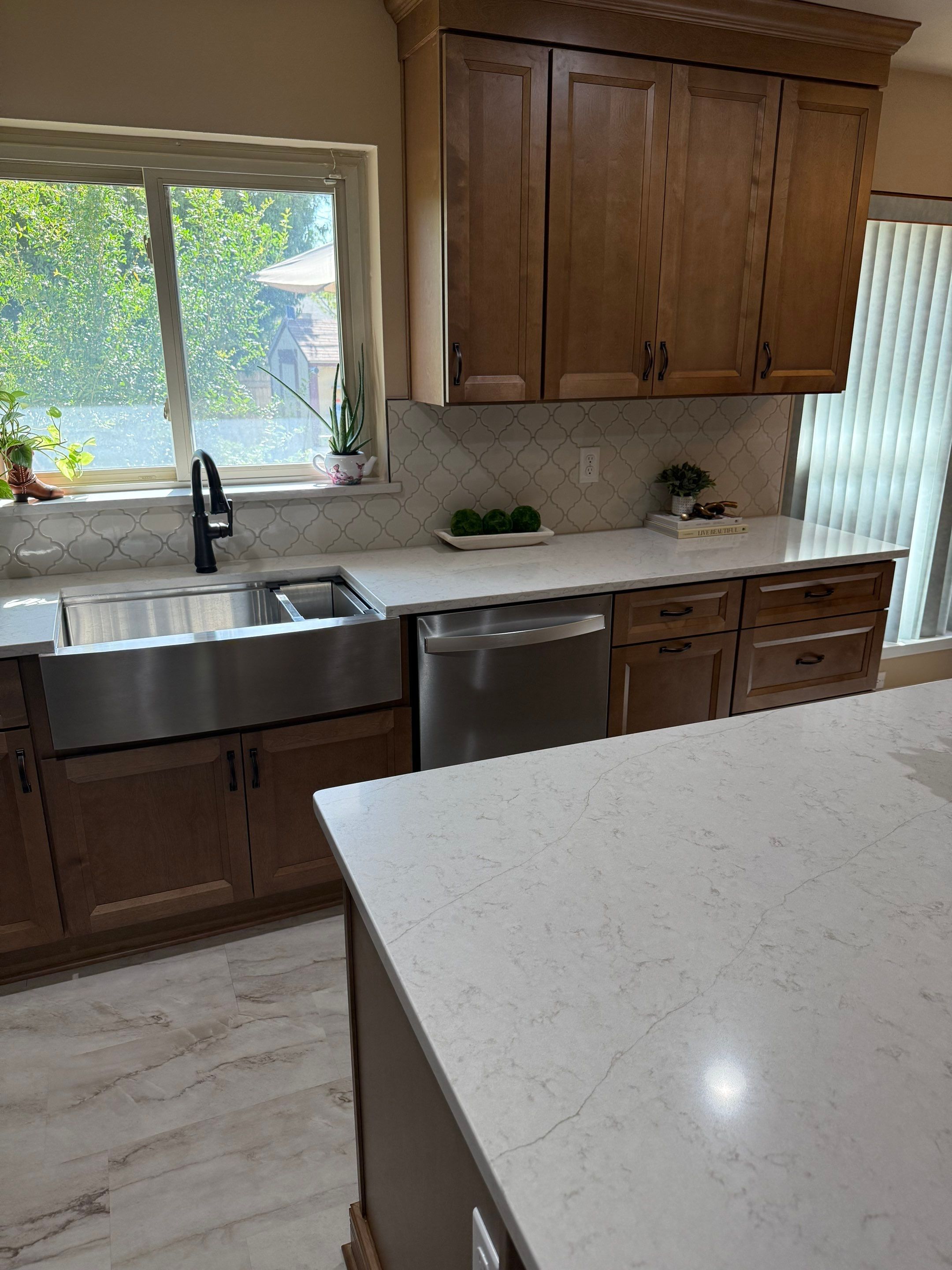 Windcrest Kitchen Remodel Peninsula to Island Before and After by Legacy Bath and Kitchen 