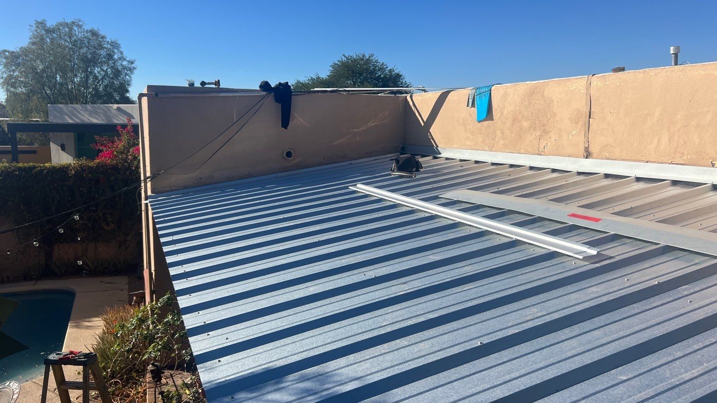 Silver Metallic Exposed Fastener by Reimagine Roofing