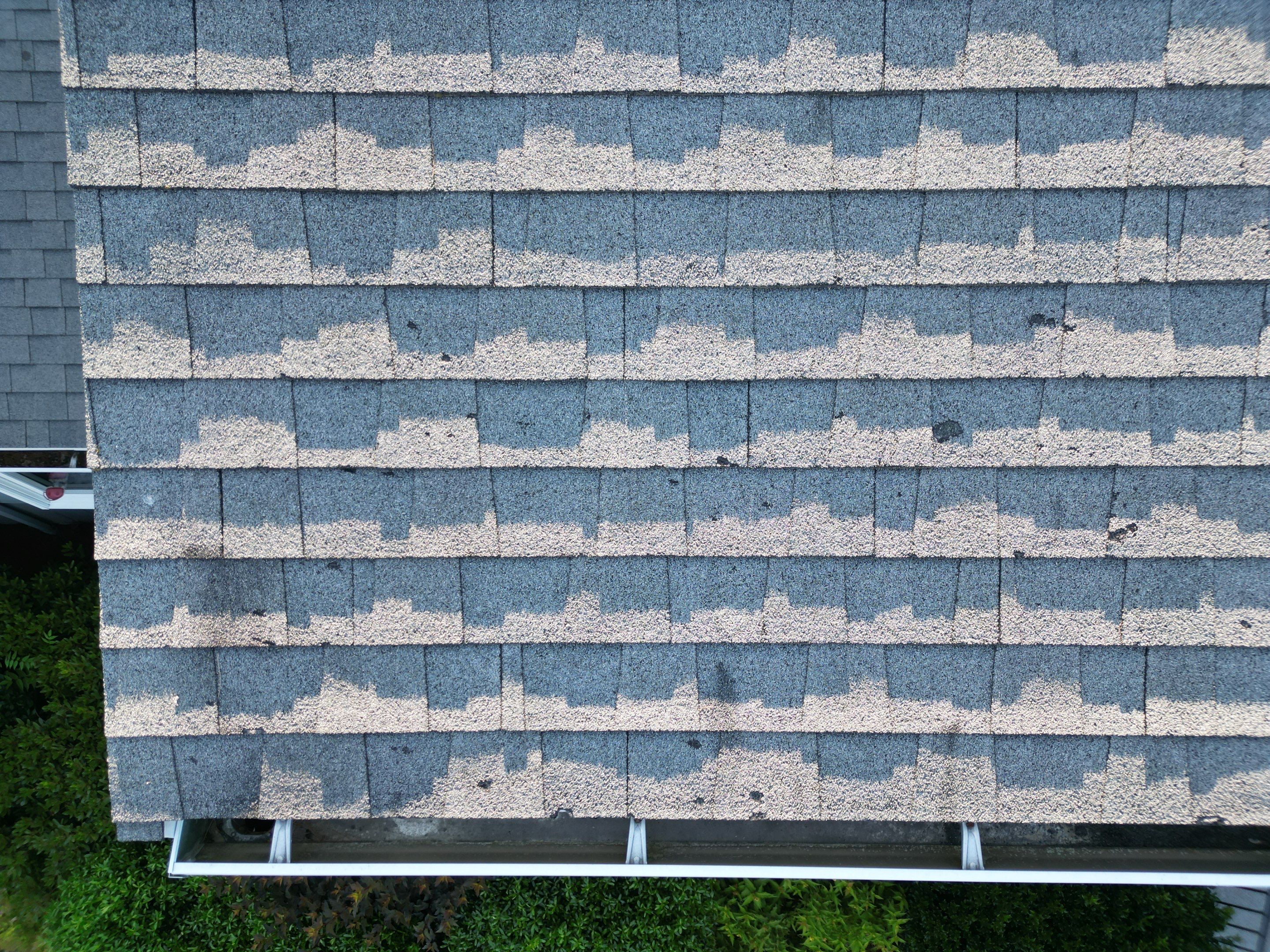 Complete Roof Replacement with Chimney Flashing, Gutter Guard System, and Vinyl Siding Repairs by Mighty Dog Roofing of Greater Middlesex County