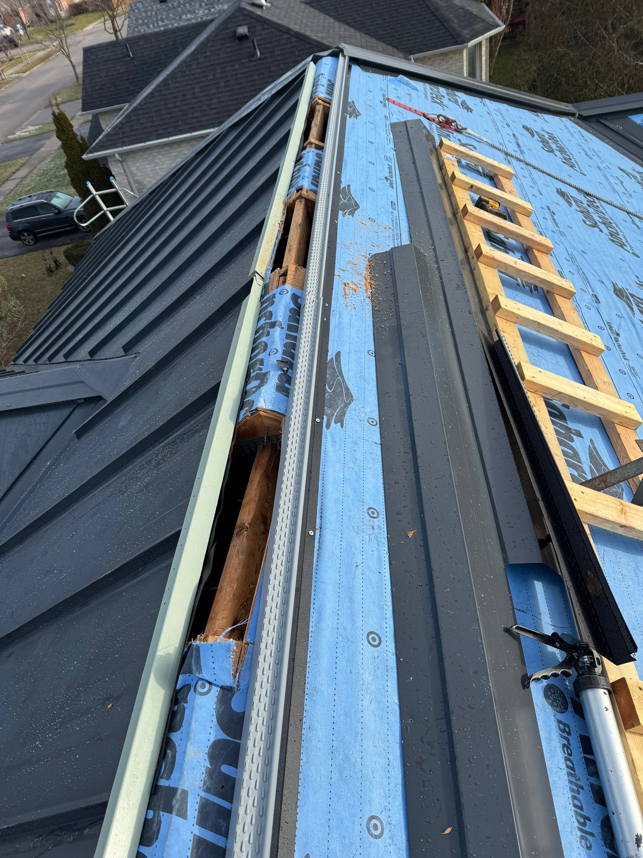 Roof Replacement using 16" Standing Seam Panels by Jay Carter Roofing & Sheet Metal