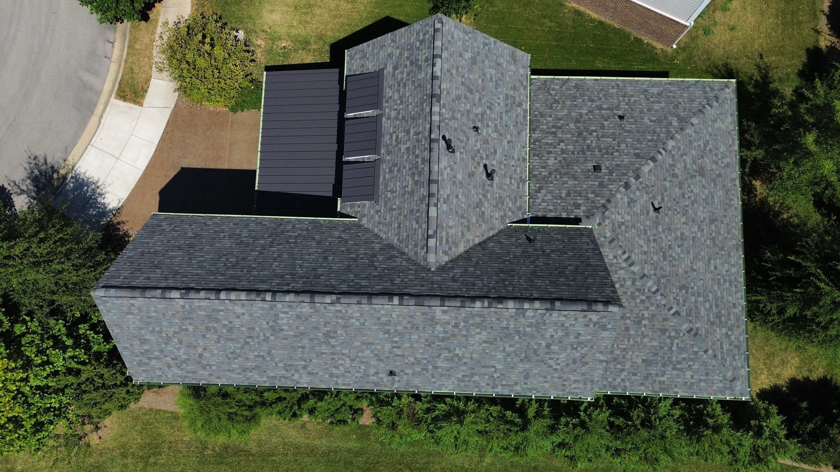 Residential Roof Replacement and Bronze Gutter Installation in Franklin by Shinglesmiths Roofing